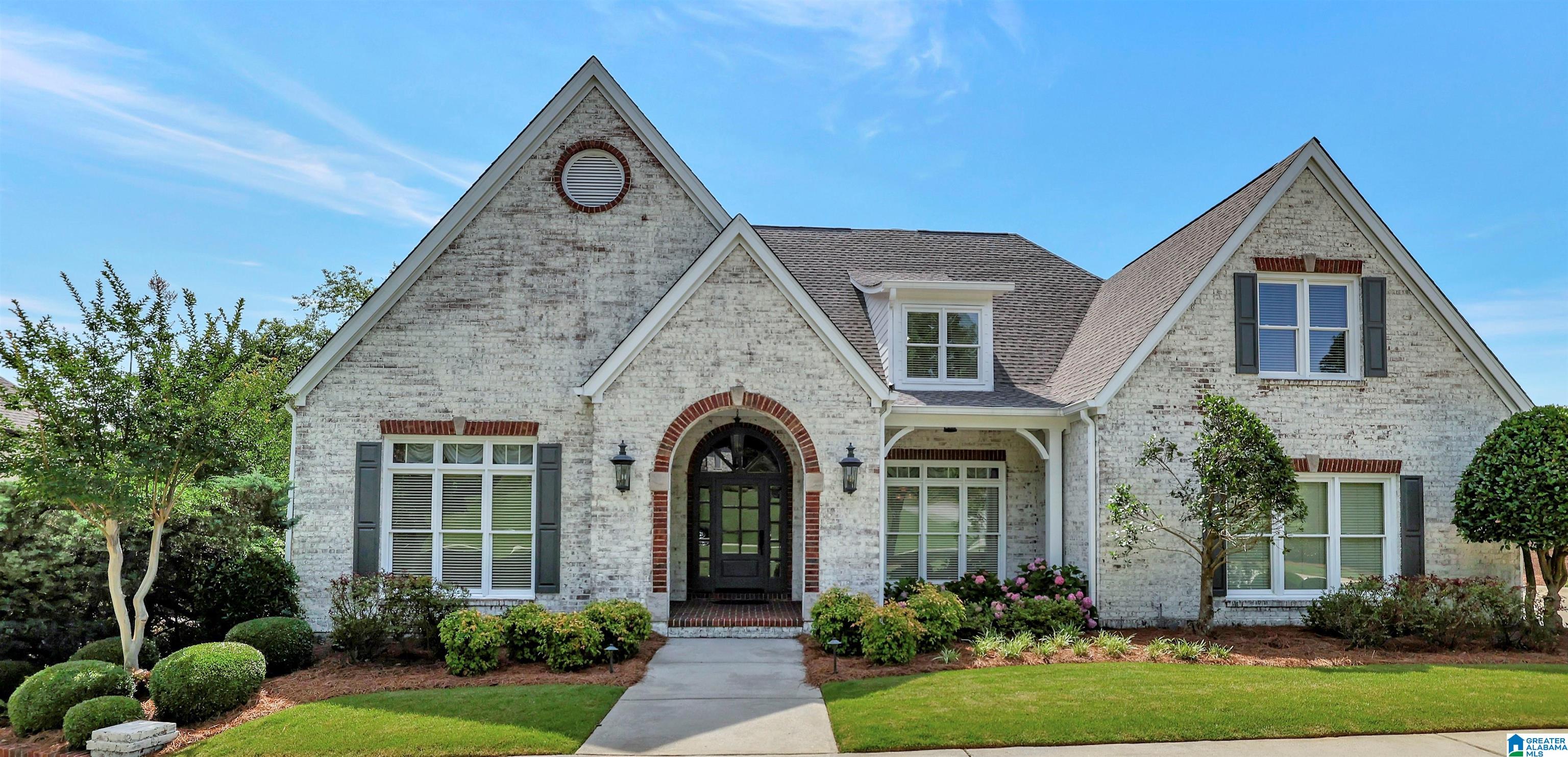 This beautiful home is located in the gated community of Highland Lakes.  On the main level is a formal living room/office with French doors. The dining room flows into the family room with a fireplace and eat-in kitchen with an island. The gourmet kitchen has a gas range with five eyes, a double oven, beautiful stone countertop space and pantry. A door from the kitchen leads to a large screened-in porch; perfect for your morning coffee and extended entertaining space. Also on the main level is a master bedroom with an oversized bathroom. The bathroom has a jetted tub, separate shower, split vanities and walk-in closets. The second closet has a California Closet organizer. A laundry room, half bath, and two car garage are also on the main level. Upstairs are two spacious bedrooms with a shared bath; an ensuite with a full bath and an office/playroom. The lower level has natural light with a full kitchen that opens to the media space/game room. Offices on the second level and basement.