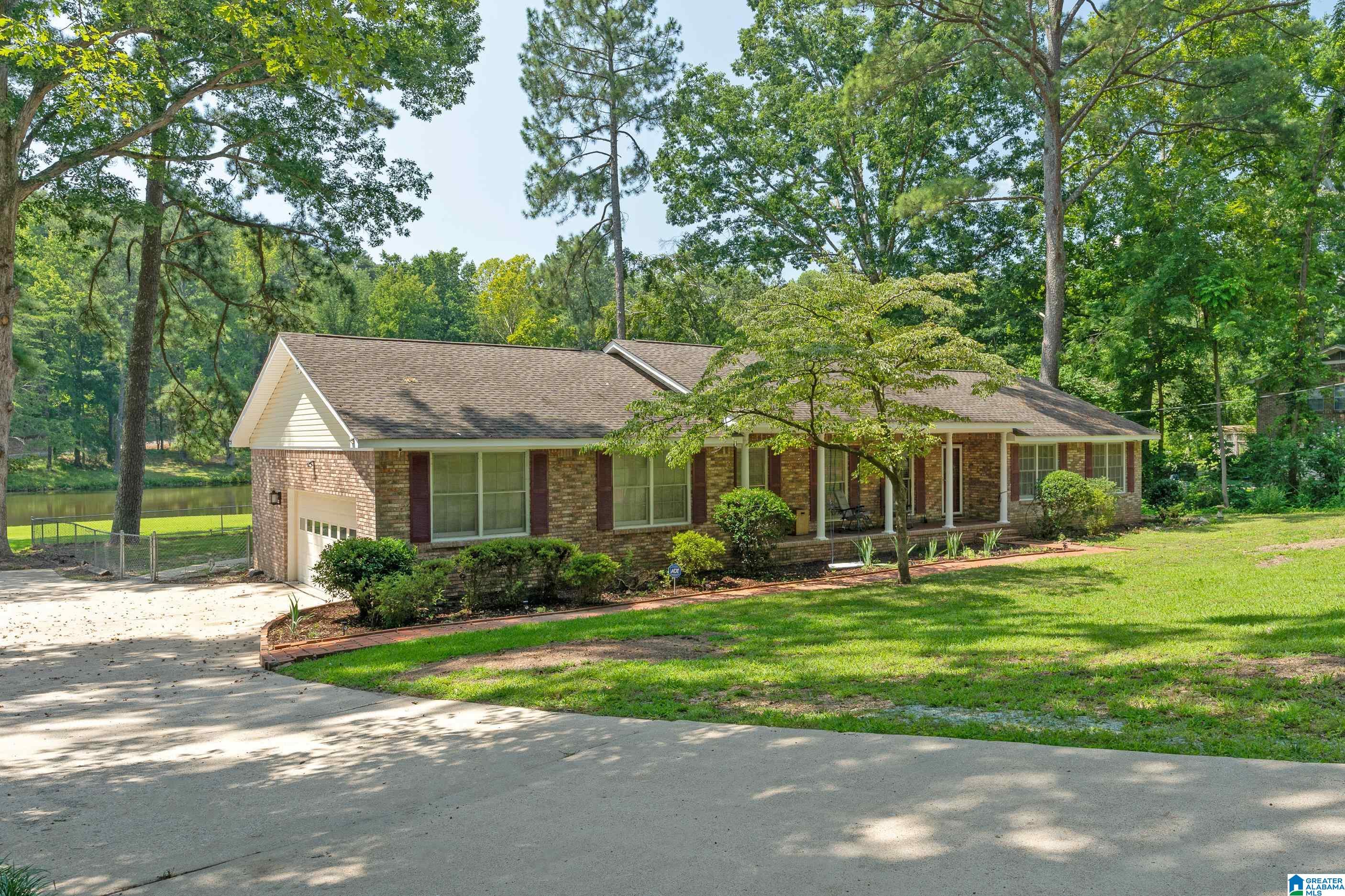 SELLERS TO OFFER A CREDIT NOT TO EXCCED $7,500 AT TIME OF CLOSING TO GO TOWARD ANY OF THE FOLLOWING: BUY DOWN POINTS/LENDER CREDITS/1-YEAR FLOOD INSURANCE. Renovated 3Br-2Ba home overlooks private Shadow Lake on .65 acres! Year-round, vaulted ceiling sunroom w/lg tinted window viewing lake. Private master en-suite w/standing shower, soaking tub, vanity (20’). Hall bathroom w/vanity & tiled shower-tub combo (20’). Both bathrooms’ have new flooring, lighting, mirrors, & plumbing. Front living rm (game rm) & dining rm (gym) are great entertainment spaces. Open eat-in kitchen incld painted cabinets, lighting, tile flooring, built-in bar, electric cooktop, & dishwasher (2021-2023). Inviting living room has a gas/woodburning fireplace & built-ins. Two addl. bedrooms on the front of the house. Other 20’ to 23’ updates=exterior pressure washing; brick pathway; security door; engineered flooring, painted interior, smart lighting, smooth ceilings, & crown molding throughout. HVAC=19’ Roof=15’