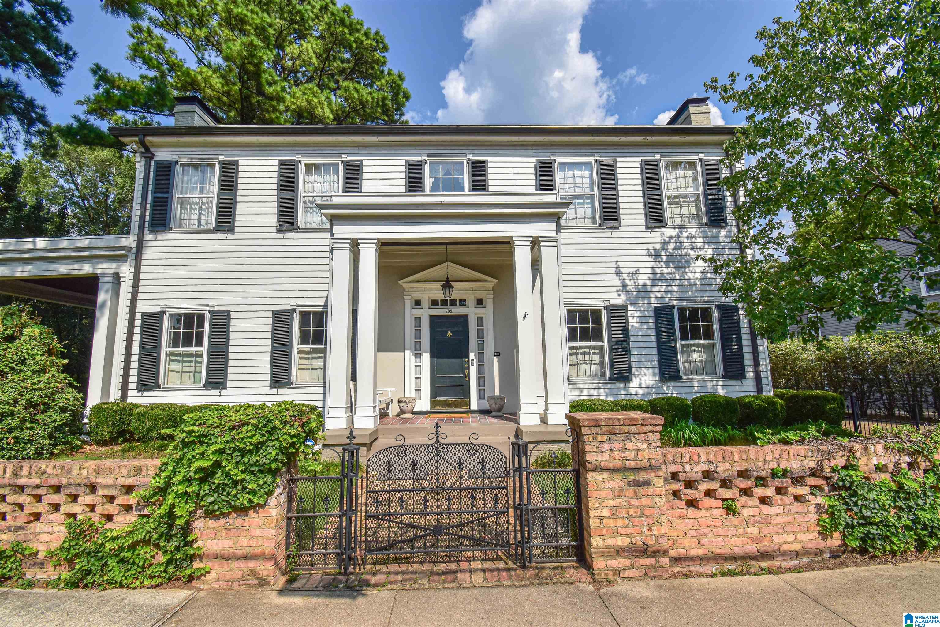 Built in 1842, this meticulously preserved home with more than 5,000 sf is one of a kind. Recently renovated kitchen, 9 fireplaces, heart pine flooring throughout, 10+ ft ceilings, built-in storage, 5 spacious bedrooms with a primary suite on the main level, a sitting room with heart pine from the Talladega National Forest.....these are just a few features that make this property spectacular. Located on a half acre corner lot in the original Historic District, this home is less than a mile walk to Bryant Denny Stadium and 2 blocks from University Blvd. Entertaining is a breeze with multiple exterior porches and a massive screened porch. Many improvements have been made while maintaining the character and integrity of this beautiful historic home.
