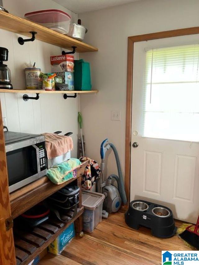 Right off the Kitchen being used as extra pantry space/mud room area. (There is another pantry as well) This could be re-established as the Laundry area if so desired.