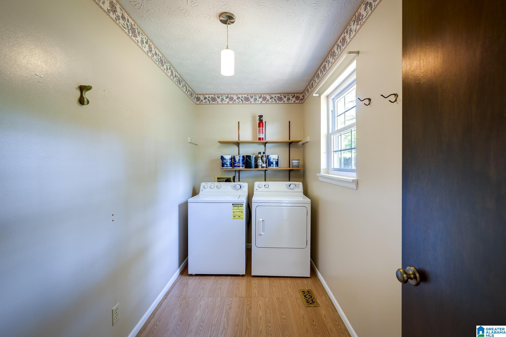 This room is large enough for a freezer and shelving and can be used as a pantry as well.