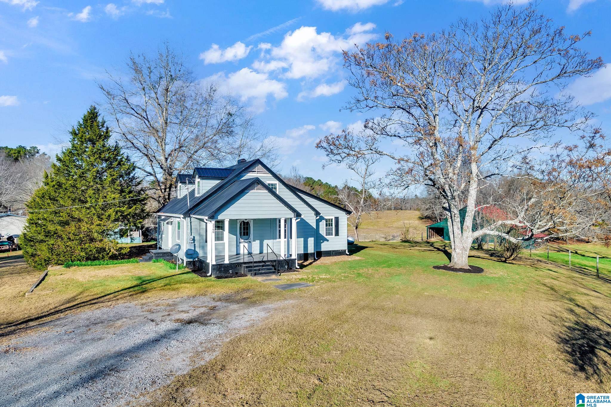 Country living at its best!  1+/- acre in private but convenient location!  This adorable farmhouse has kept its charm but added modern conveniences.  The kitchen is so appealing it could be your favorite hangout.  Home features so many updates...an all new kitchen including stainless steel appliances, luxury vinyl plank throughout, tankless hot water and energy efficient vinyl windows to name a few.  There is a main level master bedroom with its own private bath.  Upstairs are two nice sized bedrooms with delightful dormer windows.  There is another large bathroom and bonus room (4th brm/office/study?) on the main level as well.  This home is situated on a crest that has a gorgeous view of the land surrounding.  Property is ready for you to put up your chicken coop and/or start your spring garden! USDA website says home qualifies for USDA financing!  Ask your agent about this 100% financing.  Property is 1.5 mile off 1-20..15 min/Moody, 35 min/Hoover. HARGRAY is Internet provider!