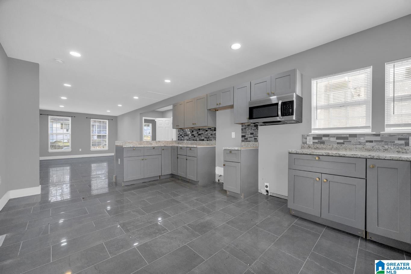 BRING ALL OFFERS! Experience elegance at every turn! Step inside to be captivated by luxurious marble flooring. This beautifully renovated 4-bedroom, 2-bath home boasts marble tile in both bathrooms, complemented by brand-new sinks and elegant fixtures throughout. The spacious kitchen is a chef’s dream, featuring brand-new cabinets and expansive countertops, overlooking living room and backyard. An open floor plan and energy-efficient windows enhance the home’s modern appeal. Outside, enjoy gatherings in the fenced backyard for kids and fur babies.  Don’t miss this exquisite renovation!