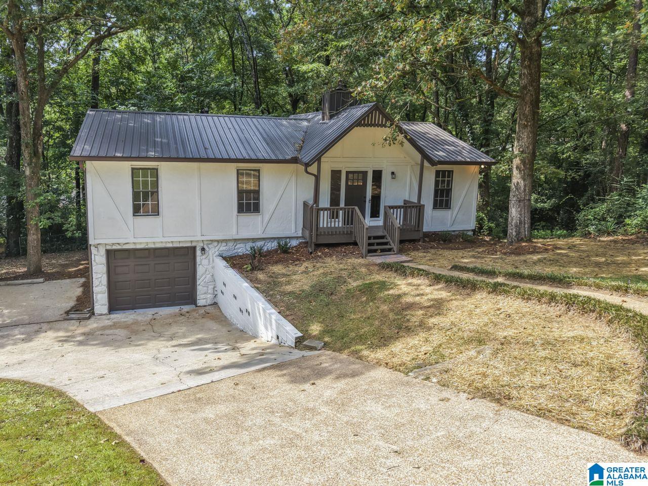 **SELLER willing to pay ALL BUYER'S CLOSING COST up to $6500 with full price offer!!**   This completely renovated home is located in the heart of Trussville on a quiet cul de sac, minutes from Magnolia Elementary. The kitchen has new countertops, painted cabinets, new range, built-in microwave and dishwasher. The dining room is perfect when the whole family is together and eat-in kitchen would be great for less formal dining. The living room has a large cathedral ceiling with a beautiful fireplace as the focal point. Downstairs has a large playroom with plenty of room to host a large gathering. Garage has room for parking, washer and dryer and storage or a workshop.  Right off the garage, is a mudroom, perfect for dropping off backpacks, sports equipment or dirty work boots.  Back porch was made for sitting and enjoying a beautiful fall nights, surrounded by mature trees.  Back yard is 3/4 fenced.  New roof, HVAC, Water Heater, paint, flooring, range and dishwasher.