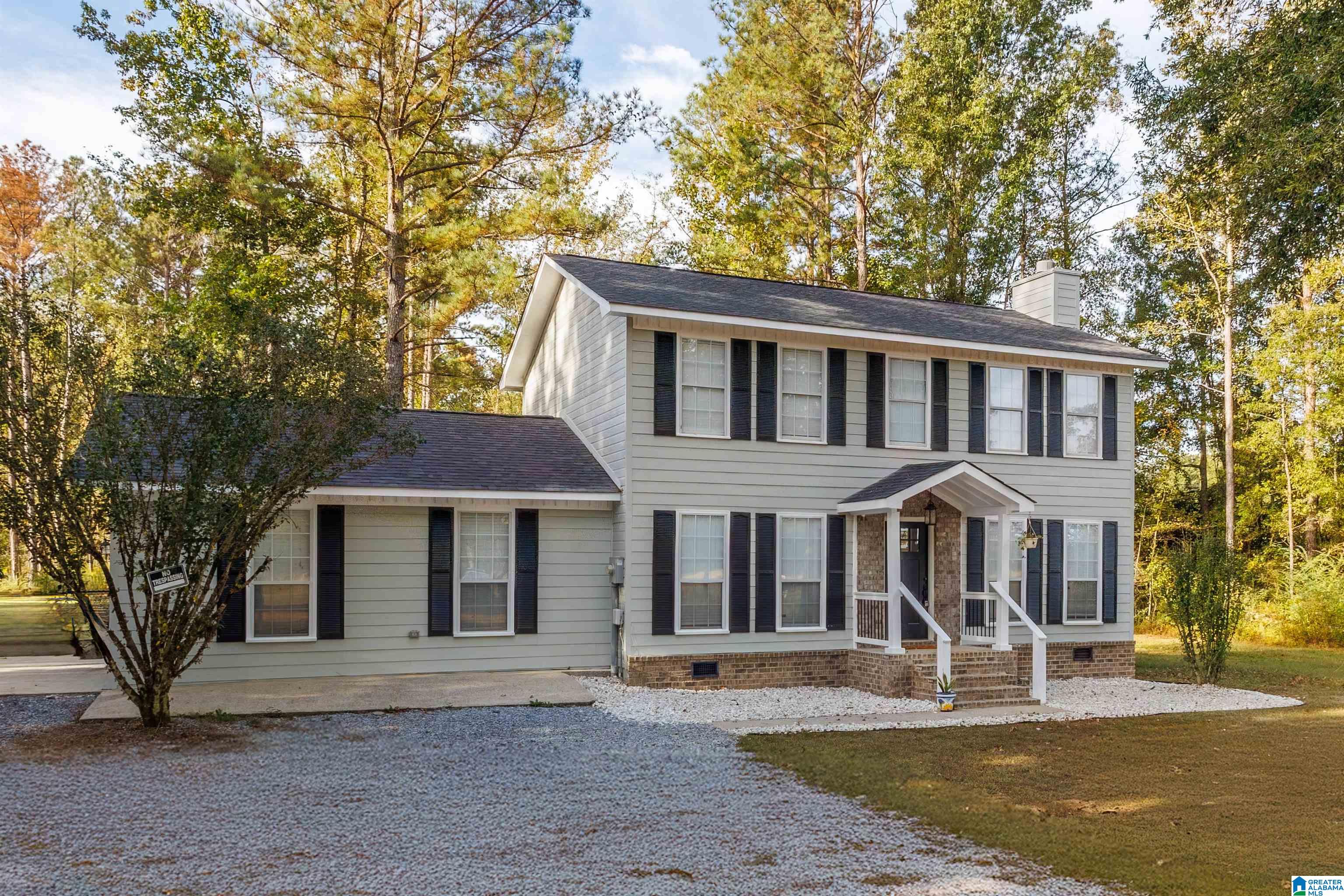 Welcome to this beautifully maintained 3-bedroom, 2.5-bath Colonial-style home set on a peaceful 3-acre lot. Step inside to find a well appointed kitchen featuring a double oven, stone countertops, and a spacious pantry - ideal for cooking and entertaining. The inviting living room is centered around a cozy wood-burning fireplace, perfect for relaxing evenings. Upstairs, the private master suite boasts a walk-in closet and en-suite bath. Outside, enjoy the durability and curb appeal of Hardi board siding, a fully fenced backyard for pets or play, and plenty of room to roam, garden, or build your dream outdoor space.