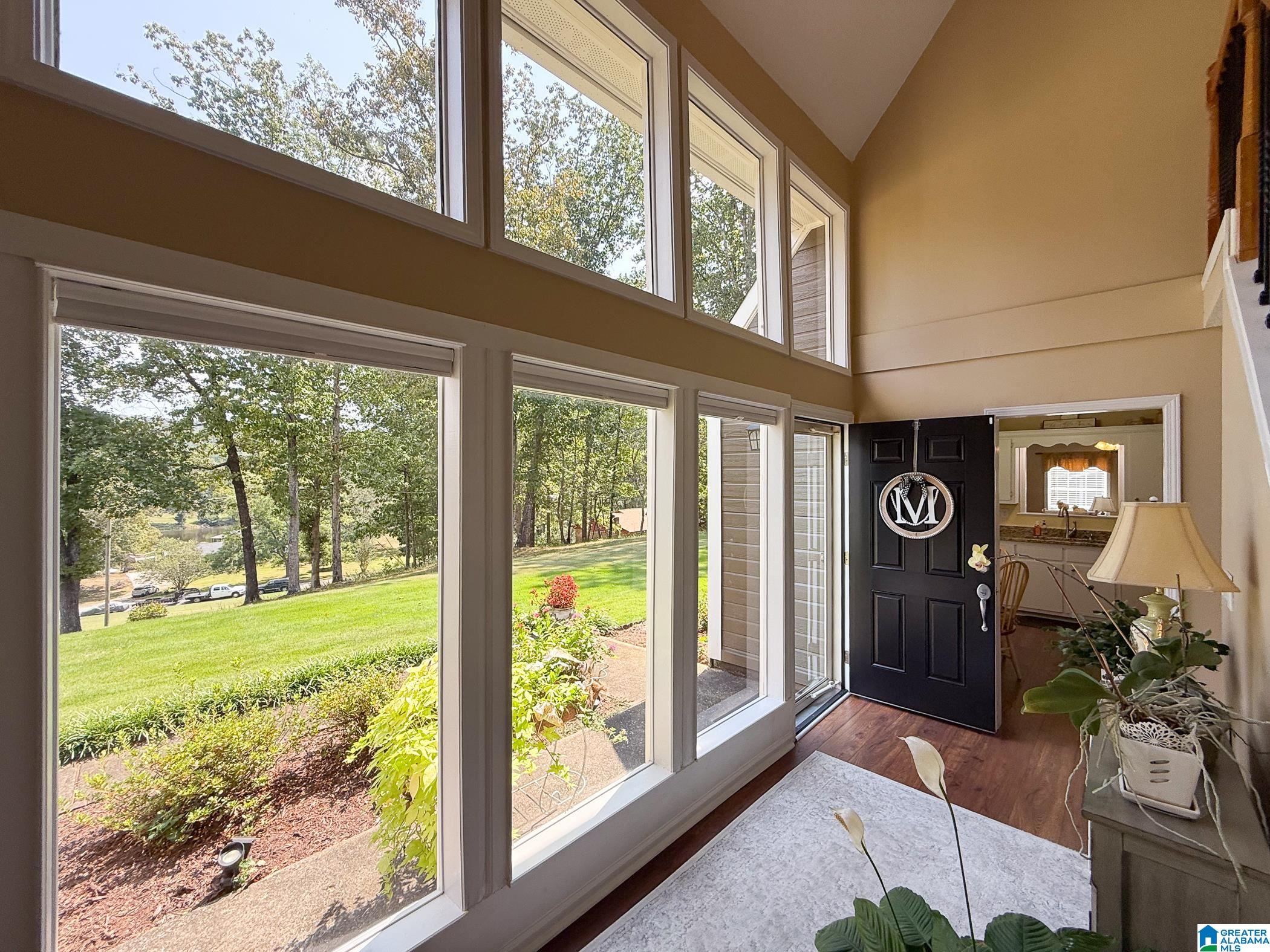 Celebrate the holidays in a NEW HOME! Ask about quick & easy financing opportunities for this amazing home! Discover this superbly maintained 4-bedroom, 2-bath home with 2,400 sq ft of comfortable living, located just north of Cumberland Golf Course. Enjoy breathtaking views, perfect zoysia grass, and unmatched privacy on this spacious property. The main-level master suite offers convenience with laundry just off the bath, while the grand foyer welcomes you with impressive plate glass windows. Updates include new flooring (2019), roof (2017), fully renovated bathrooms (2022), and fresh exterior paint (2024). Outdoor living shines with a large, attached carport, plus a detached garage and workshop built in 2019—perfect for hobbies, storage, or extra parking. Whether relaxing on the grounds or entertaining, this home balances modern updates with timeless charm. A truly rare find offering views, space, and a move-in ready lifestyle.