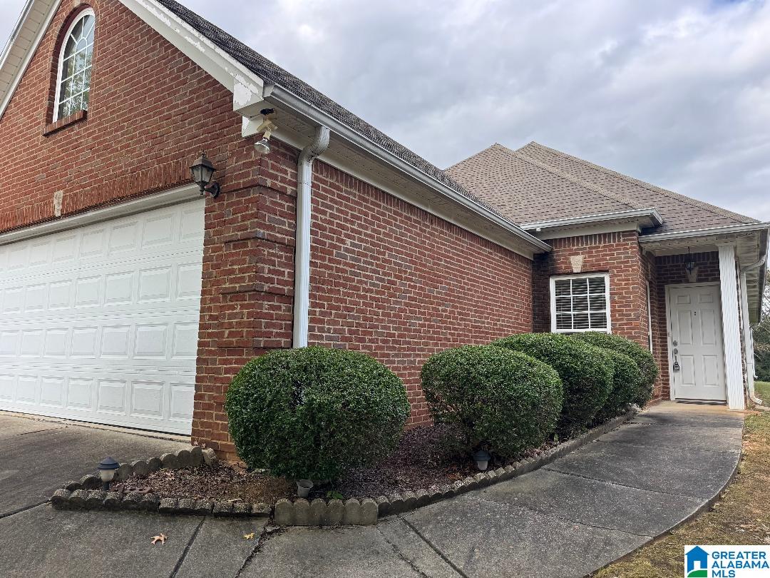 You will love this home with 1-level living  located on a cul-de-sac street in the highly desired Trussville city school system. Convenient to schools, shopping, interstate and the entertainment district. This 3 bedroom, 2 bathroom home is move-in ready! New interior paint. The inside features a spacious kitchen with eating area, Great room with trey ceiling, Master bedroom with private bath, double vanity, jetted tub, separate shower, and walk-in closet.  Two additional bedrooms and a full bath. Also a 2 car main level garage. This home has a brick front with durable, low maintenance vinyl siding. The backyard features a wonderful screened-in patio. Home is in walking distance to the Magnolia Elementary school, and subdivision includes a green space and sidewalks for your enjoyment!