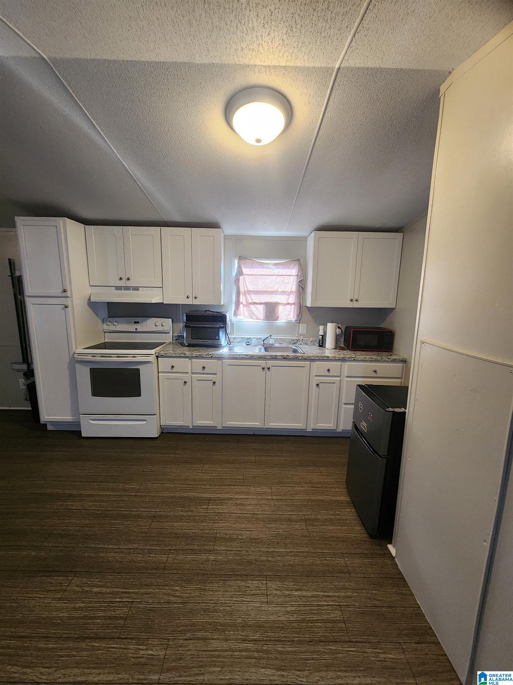 Homes for sale in Weaver, AL | 1306 Russell Dr, Weaver, AL 36277 | MLS# 21440056