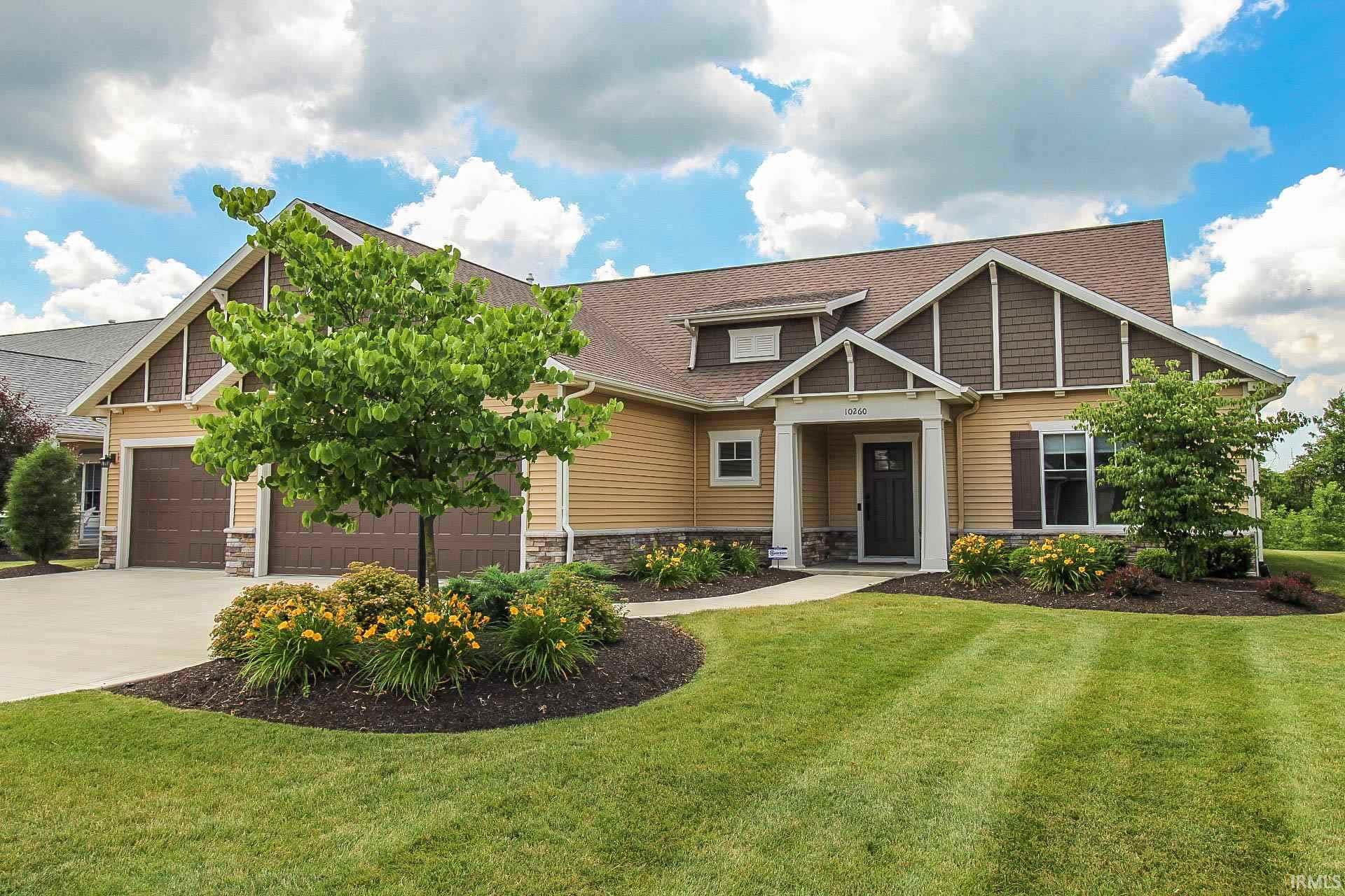 A real estate consultant takes time to discuss with clients their