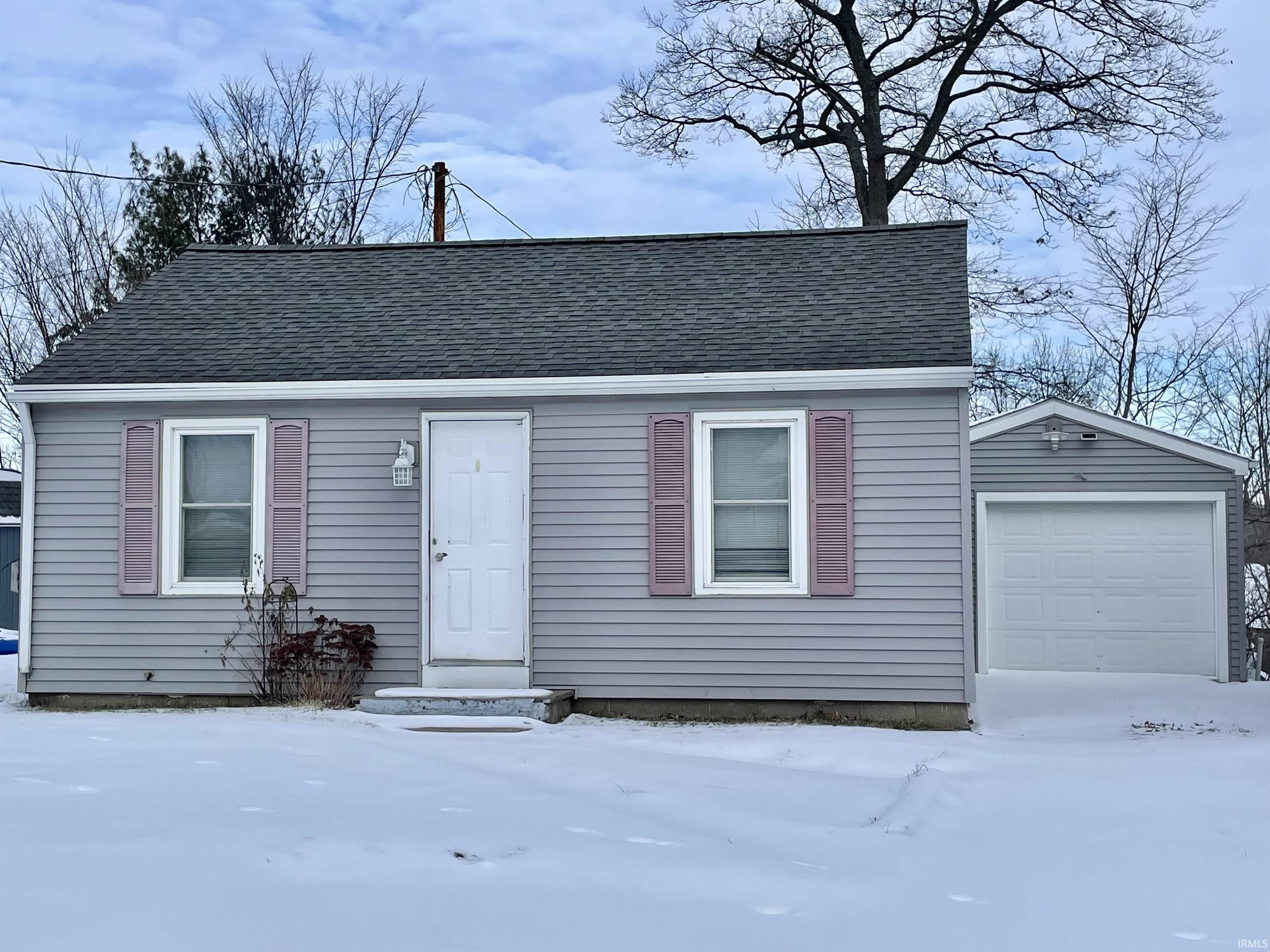 ** OPEN HOUSE SUNDAY 1/30 1PM-3PM ** Lake season is coming and this cozy cottage is waiting for its new owner! Let's face it, lake life is the best life, and this has all the great amenities without the high cost. The home has a lake view with deeded pier access, a nice porch to watch the water, and an extended 1 car attached garage that could easily fit a small workshop or even a long boat! The seller plans to leave 10 Foot of the current pier. The house just had a new tub installed and the house has been well kept for future owners. If you ever felt ambitious, you will find wood floors under the carpet in the living room. Do not miss out on your chance to call this place home by setting up a showing today!