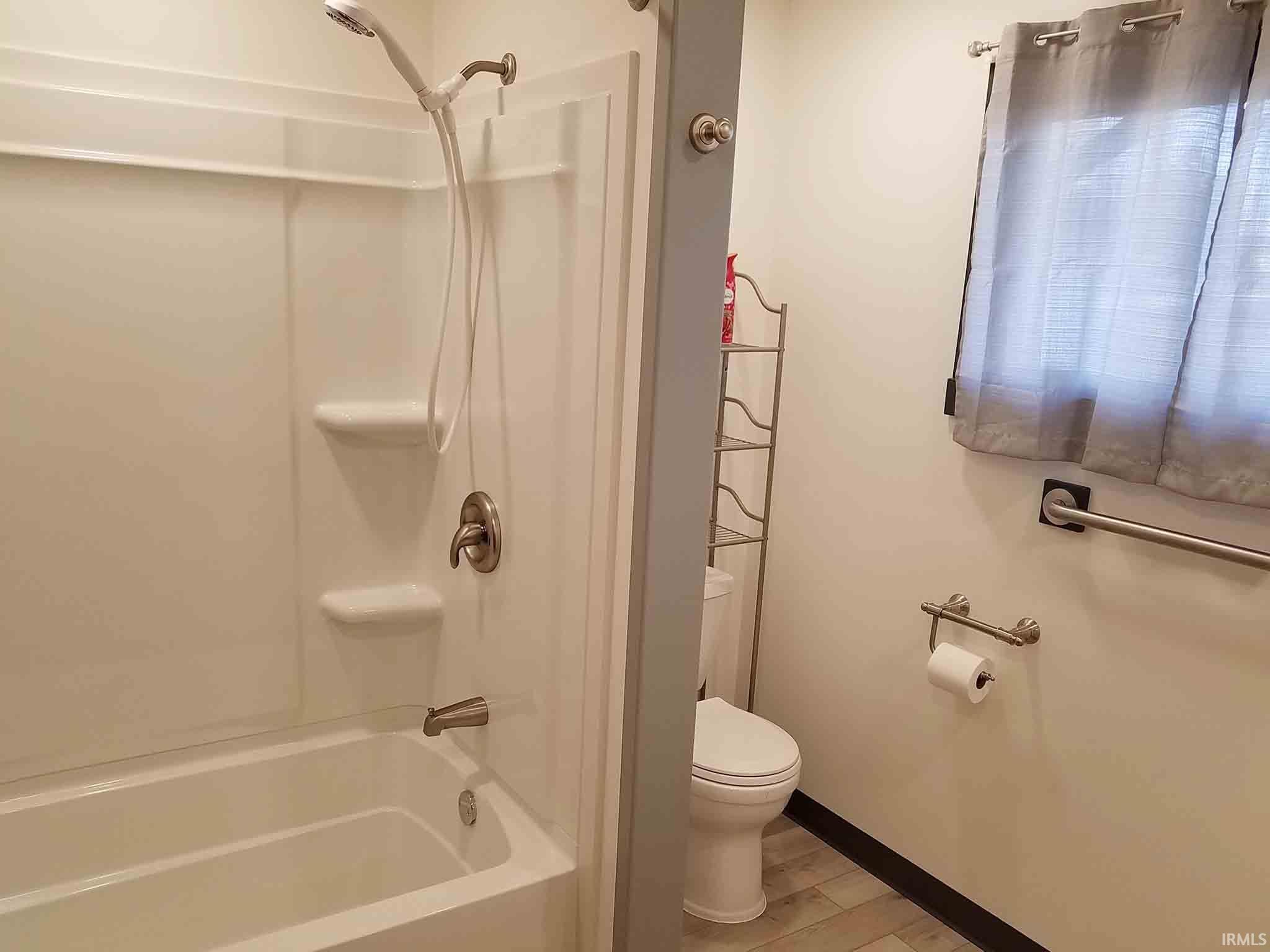 Shower in remodeled first full bath.