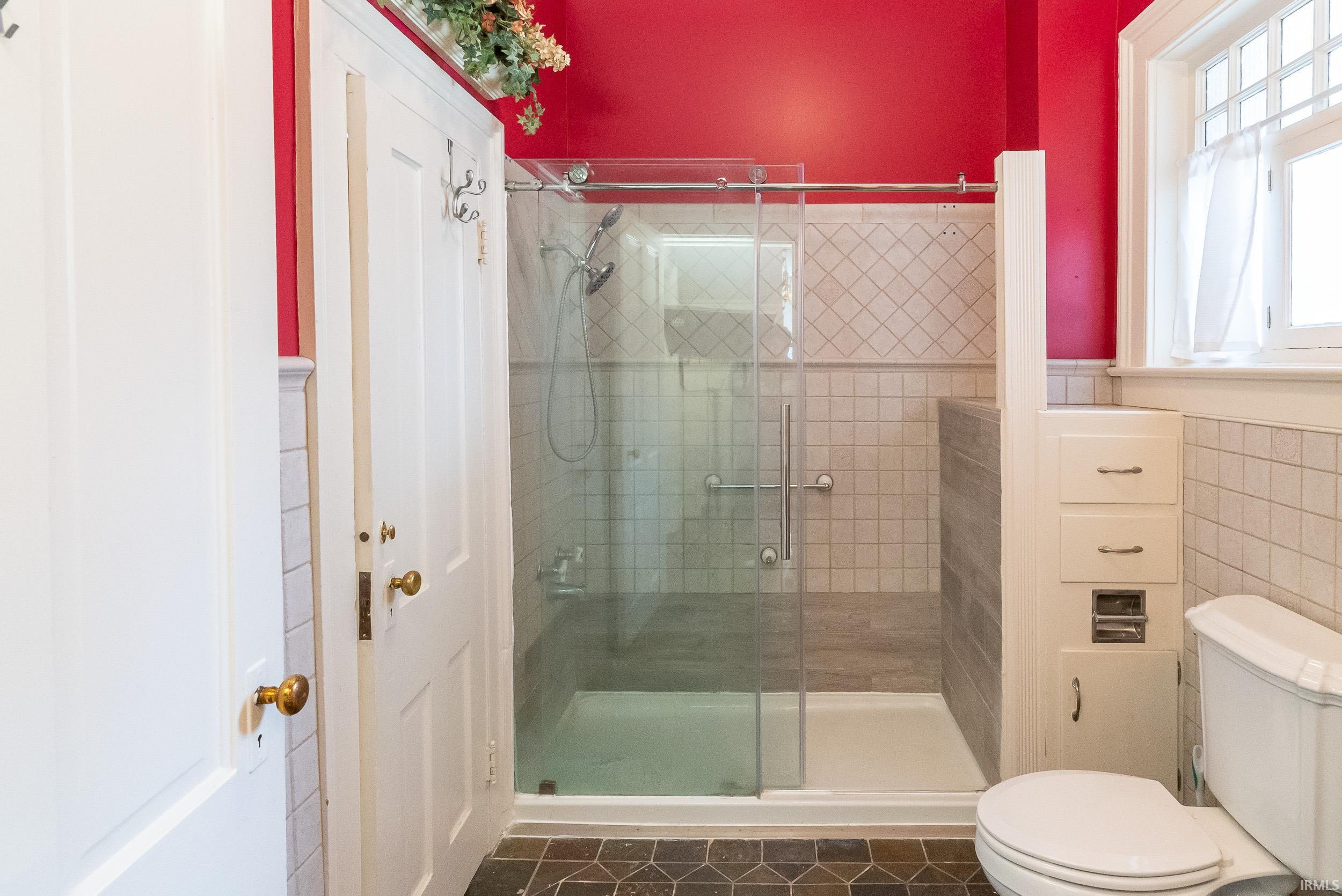 This bath room is connected to Bedroom #2 on the main floor. House has 2 water heaters so that hot water is always available even while doing laundry.