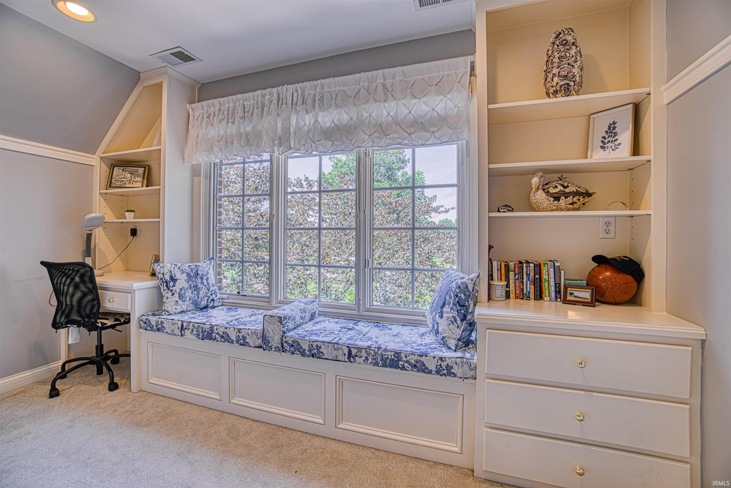 Sitting window with bench storage and built-ins
