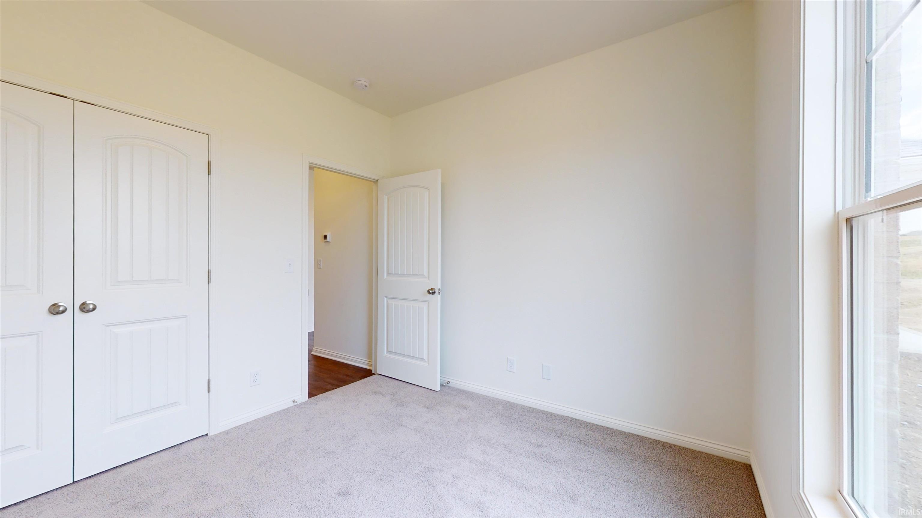 full closet in main level bedroom/office