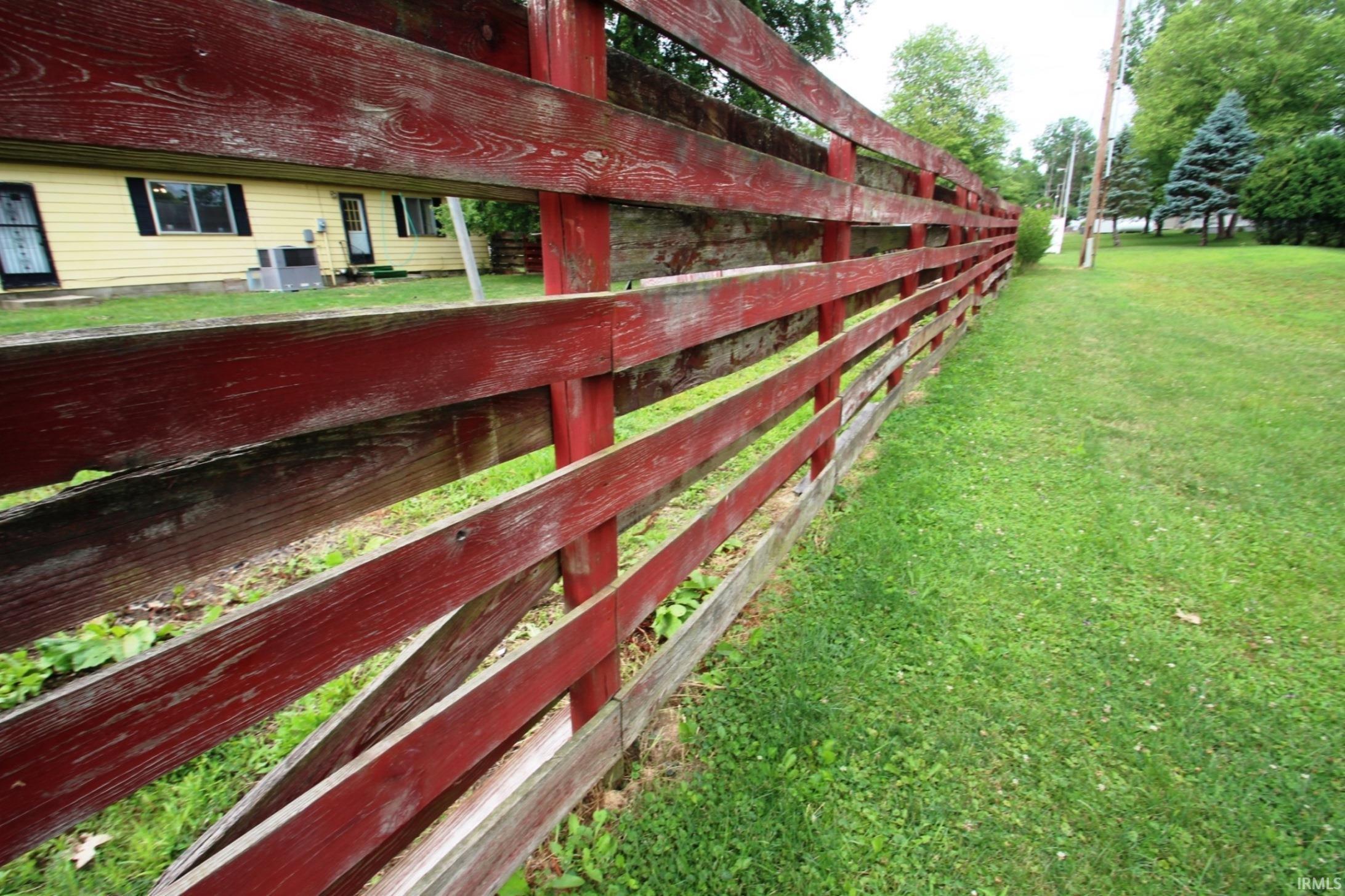 True Cypress fence.  Fencing itself is in great shape needs painting and a couple easy repairs.  RARE Fence material.