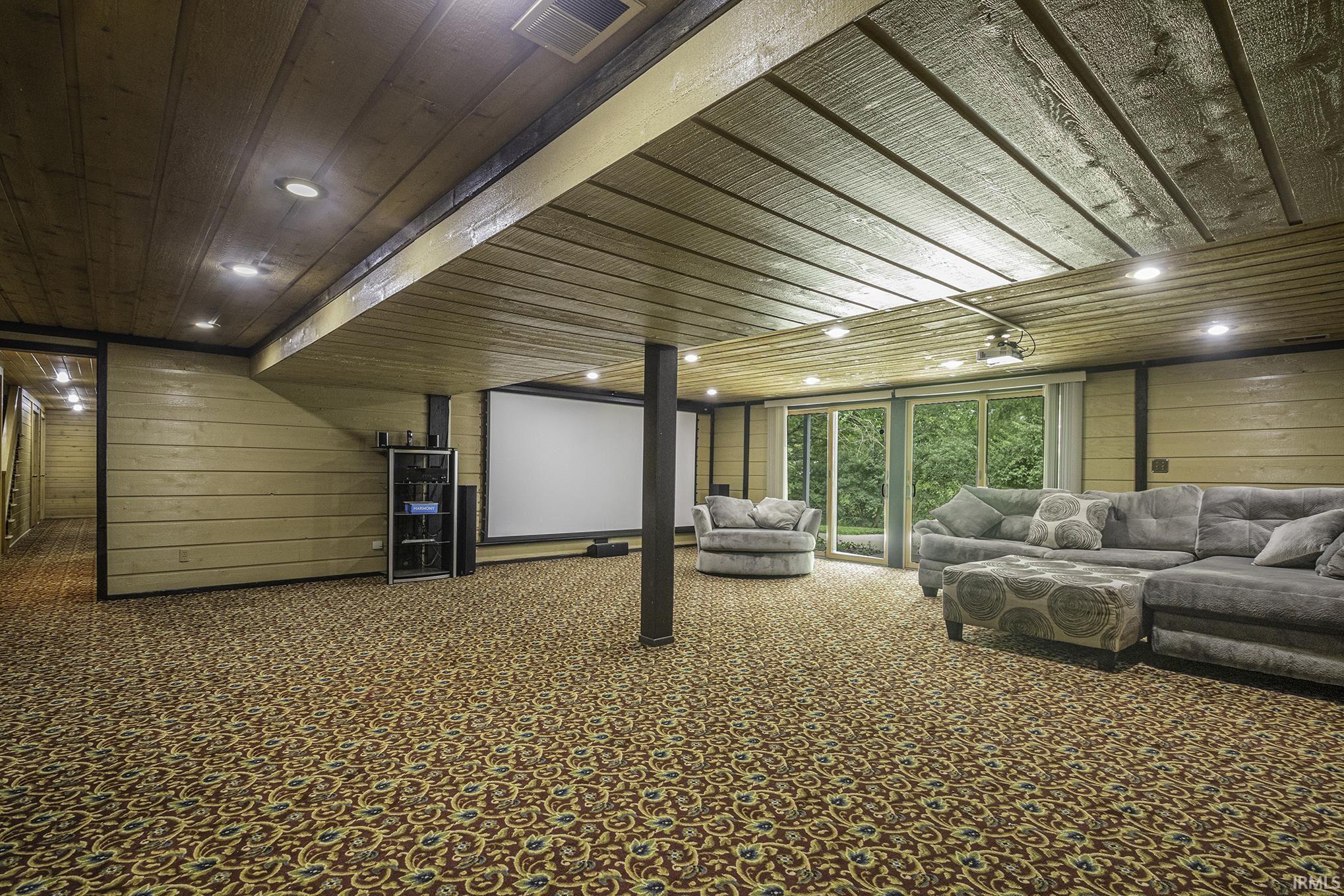 Home Theater and Surround Sound with walk out to backyard and creek