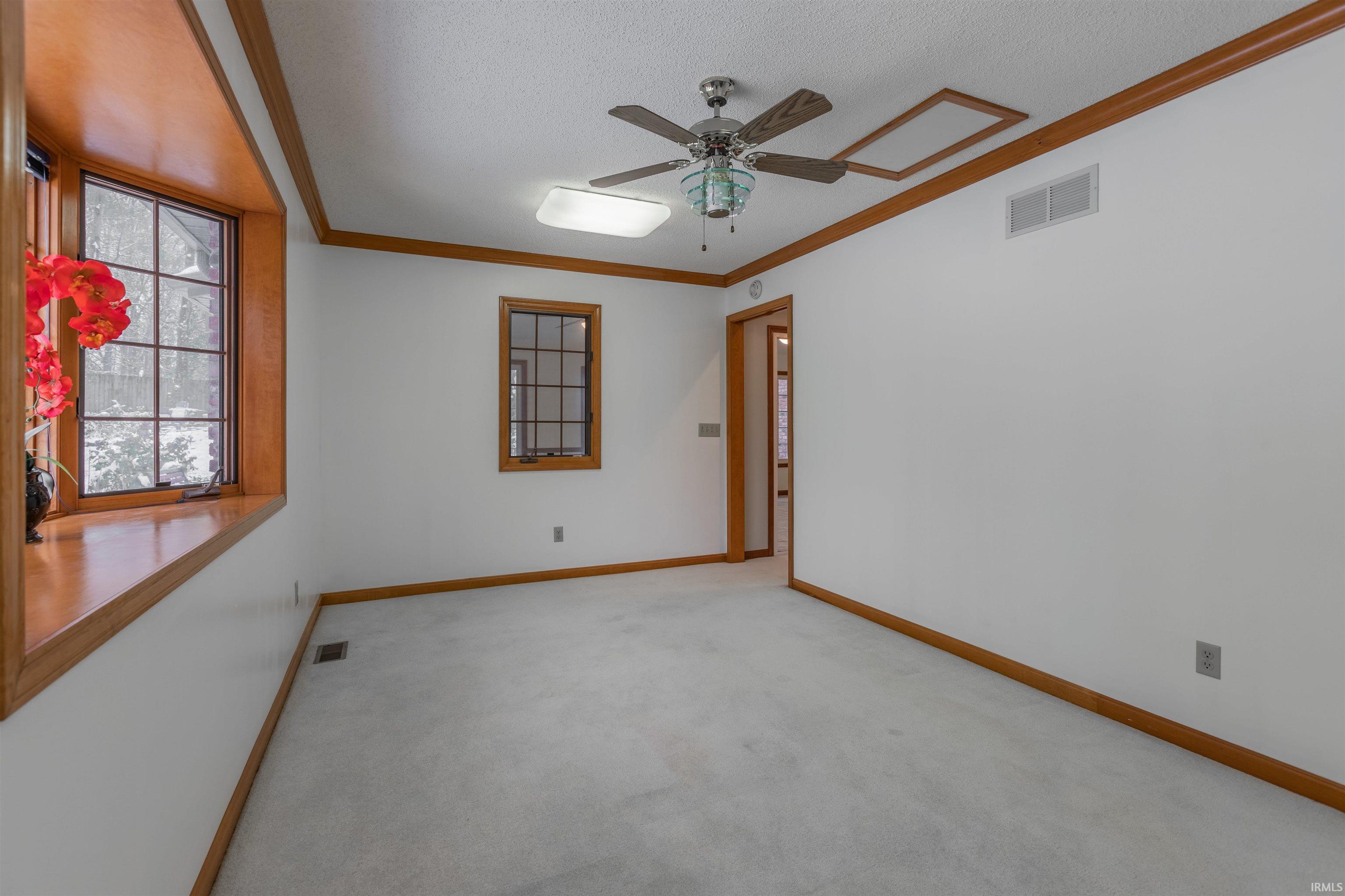 ...with Ceiling Fan, Floor Outlets, Bay Window and view into All-Weather Room