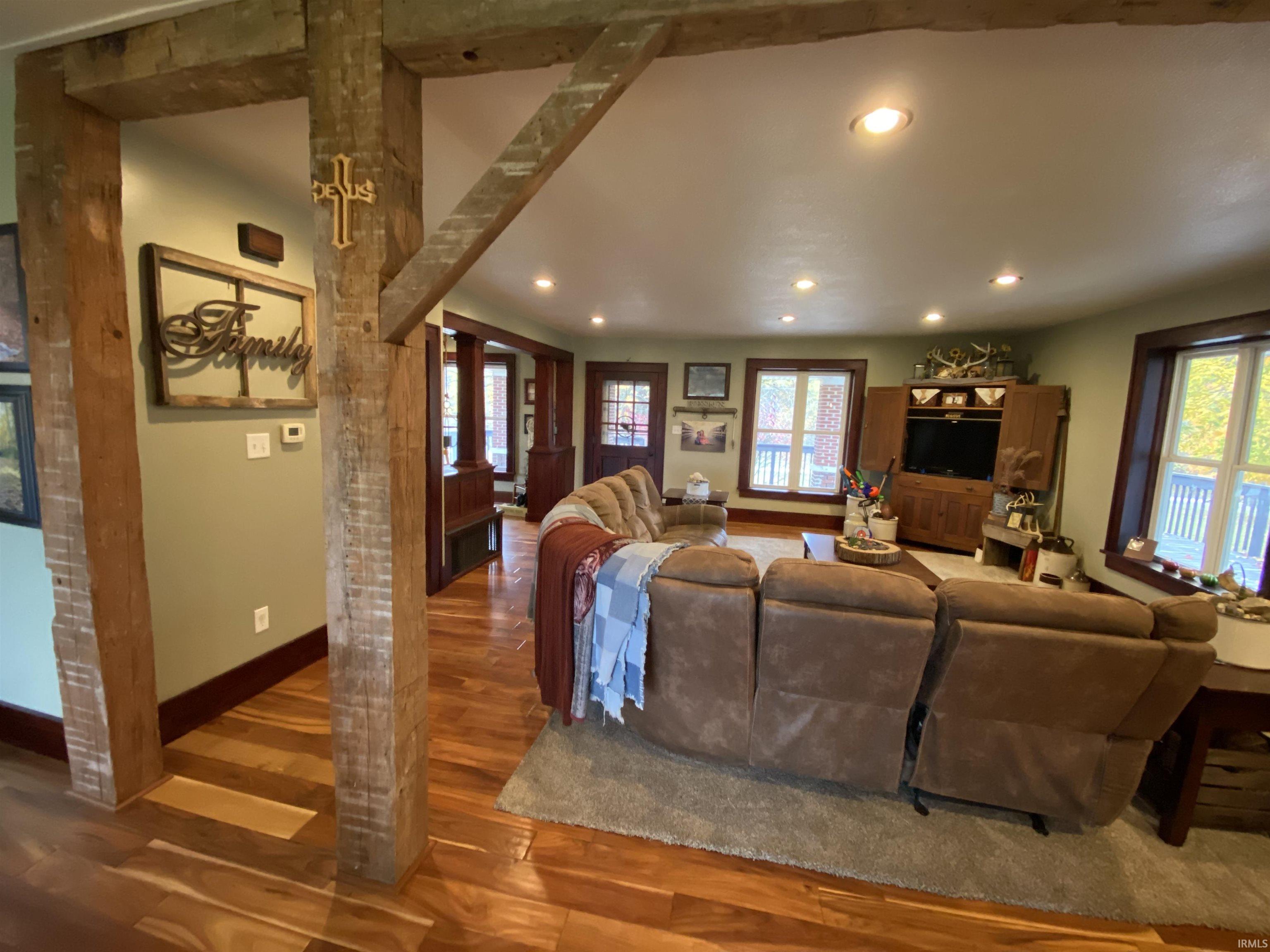 Gorgeous Beams with Hardwood Floors Throughout!