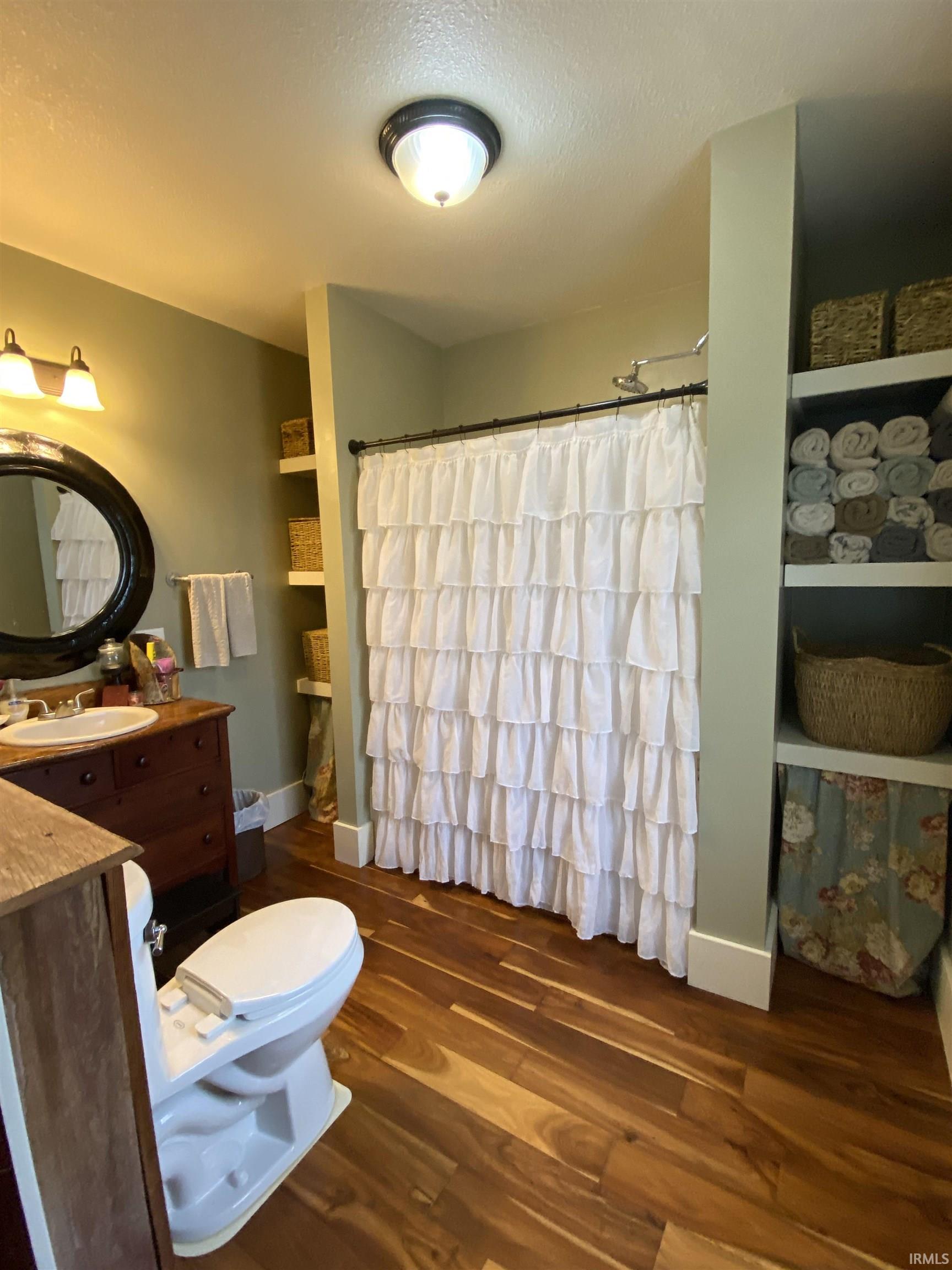 Huge Bathroom with an Antique Dresser Converted to a vanity!  2nd Main Floor with Bathtub/Shower Combo