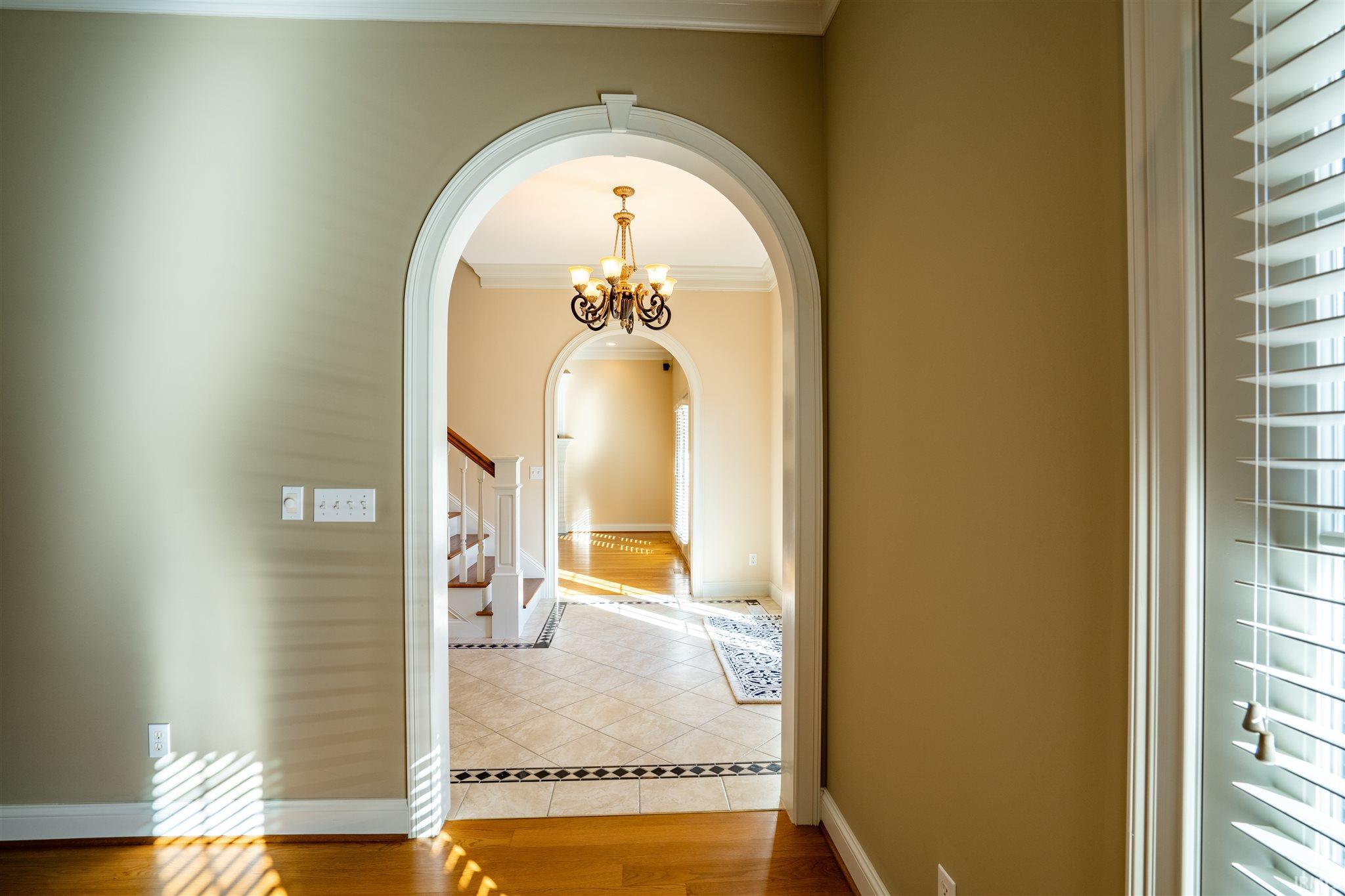Arched doorway to Foyer
