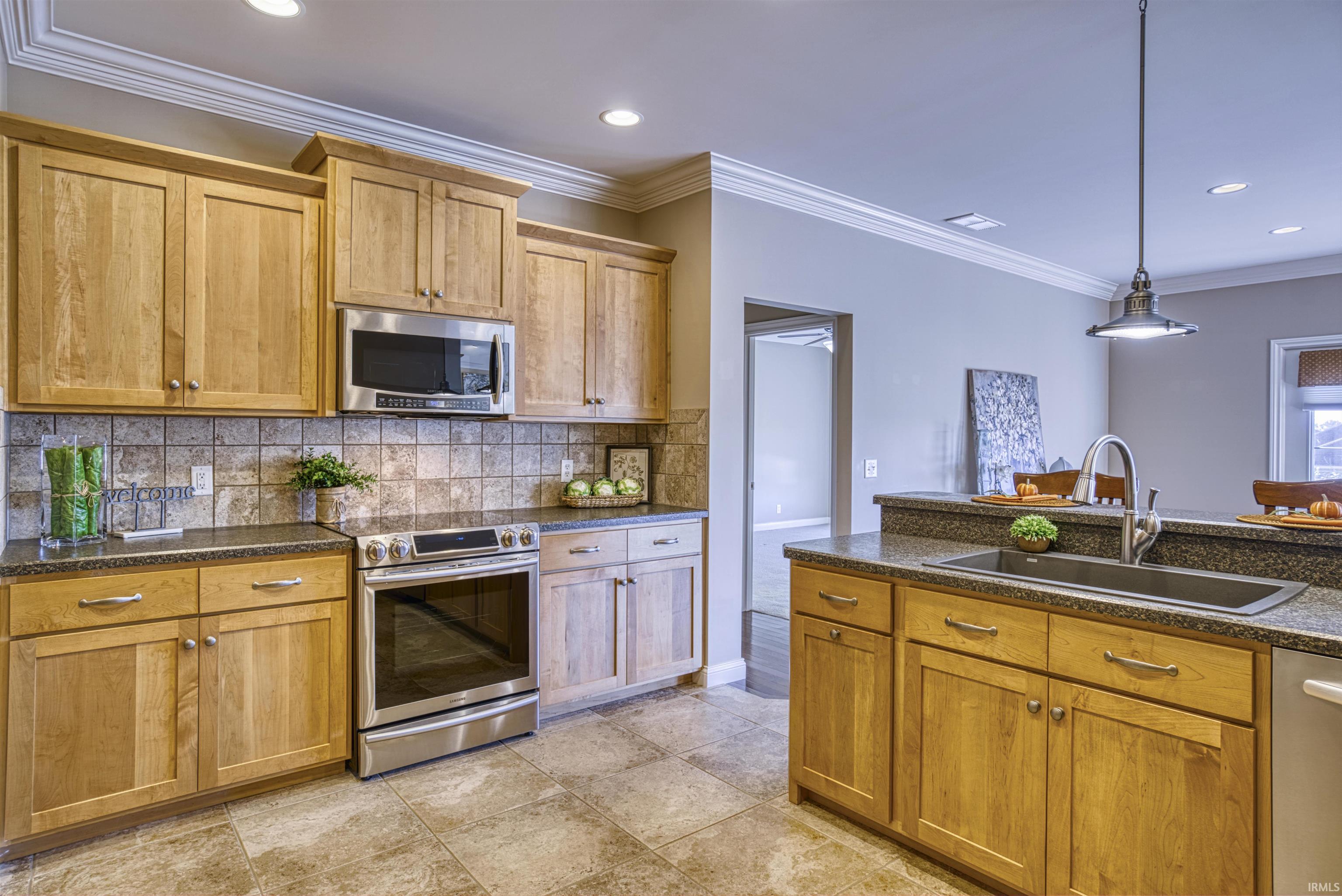 Updated stainless steel appliances and is open to the...