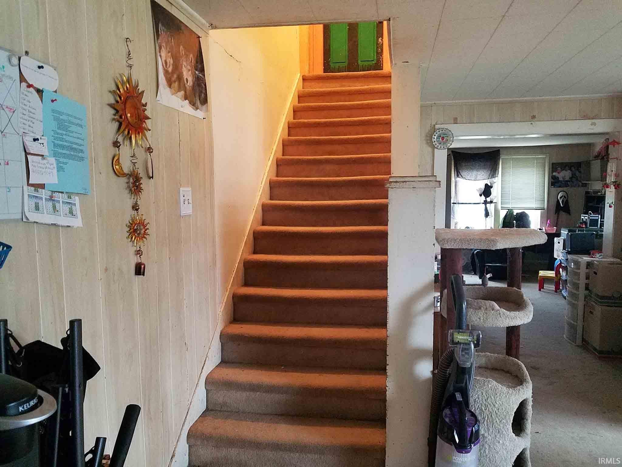 Stairs leading to bedrooms.
