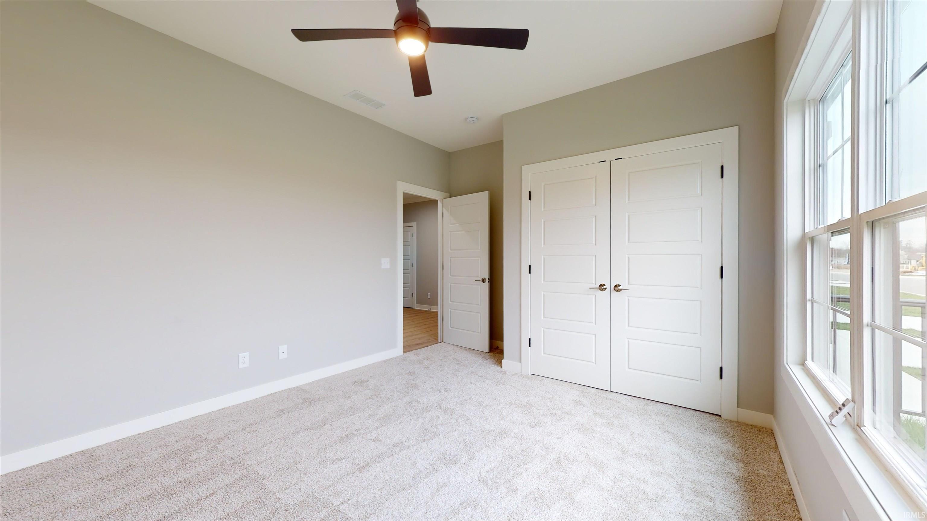 Each unit's garage comes with an 8' tall overhead garage door, which is 1' taller than standard overhead doors.