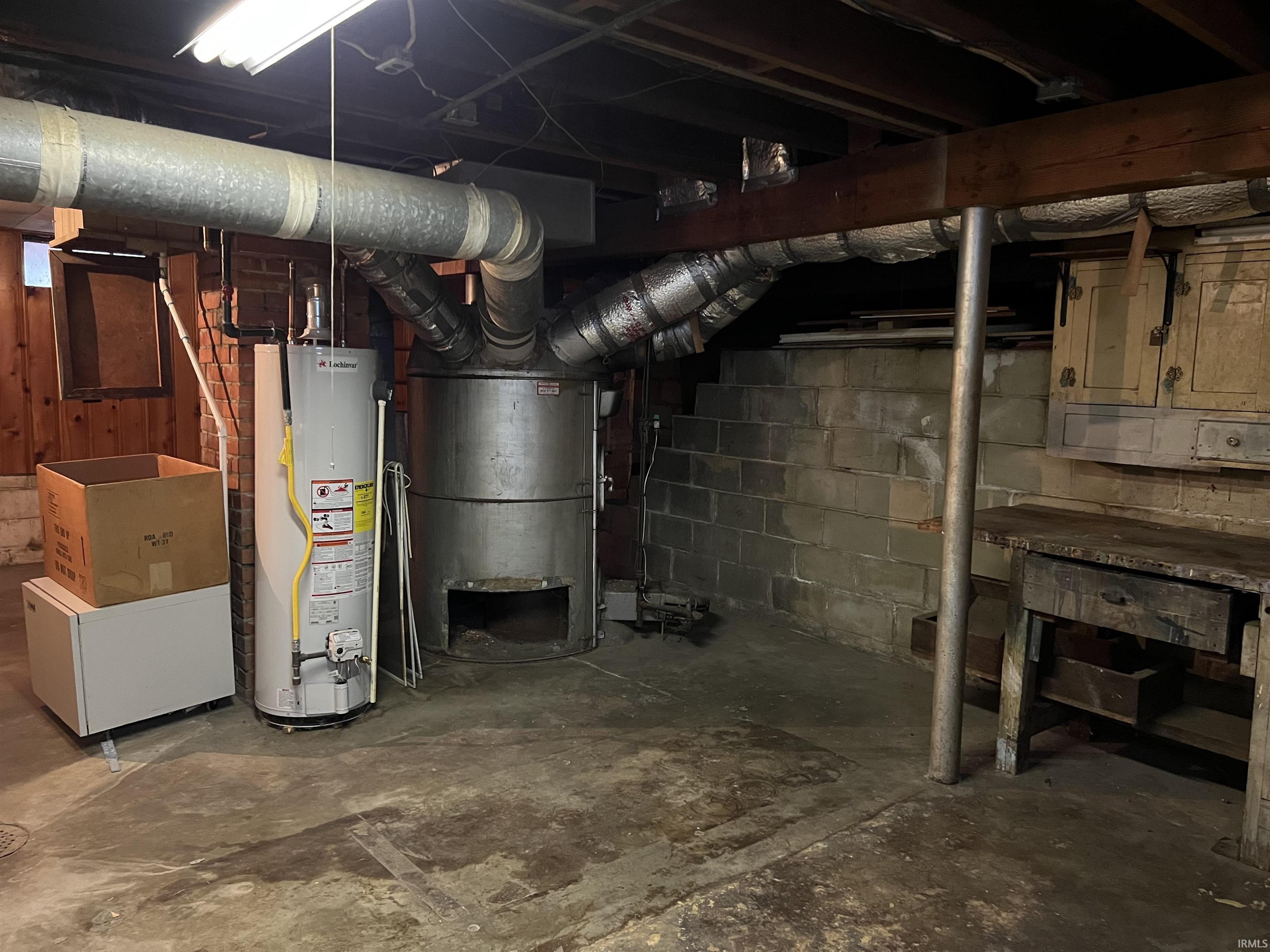 The basement furnace serves the main floor, and the upper floor has its own gas furnace and central air in the attic