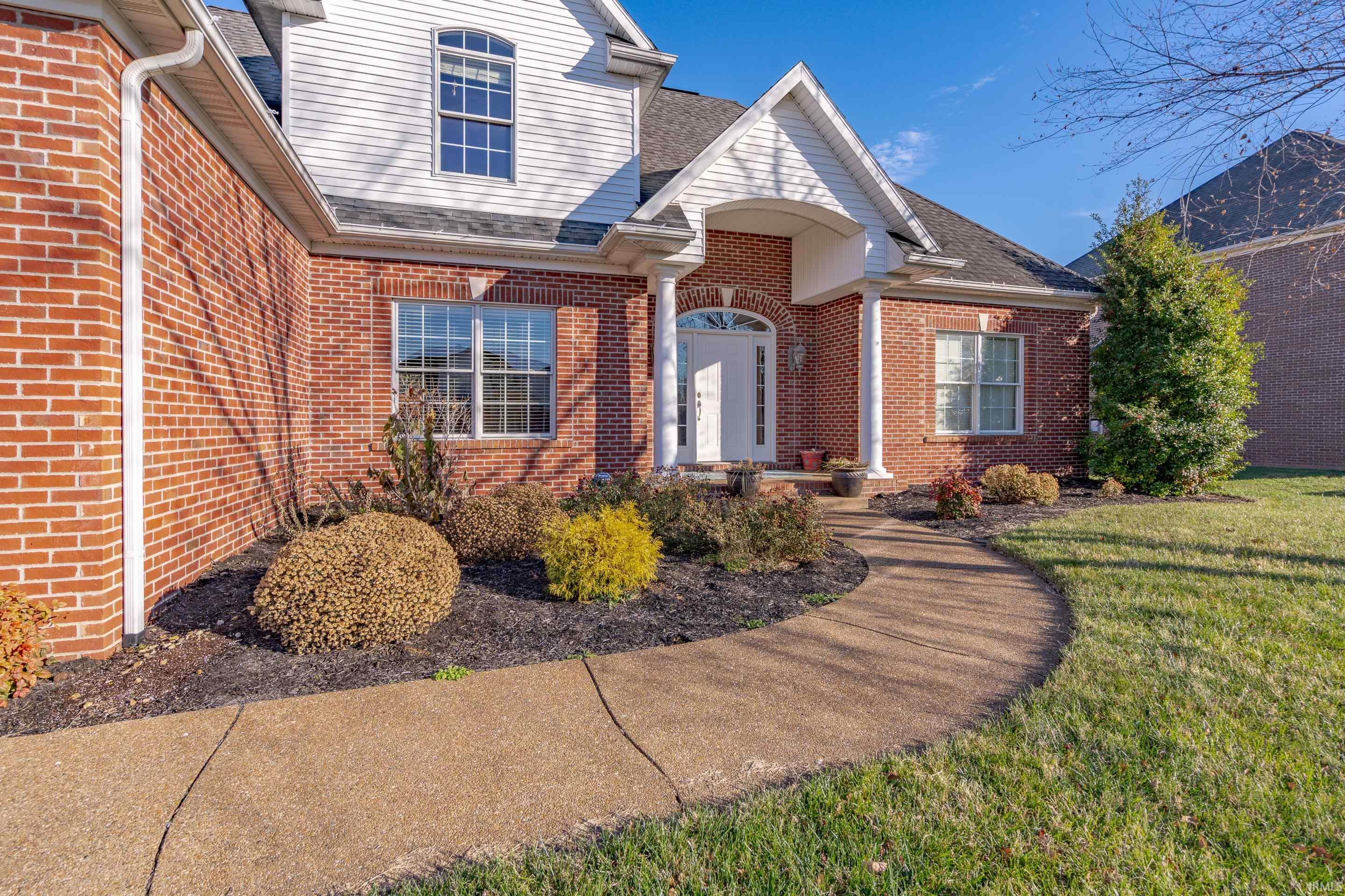 Great curb appeal with nice landscaping.