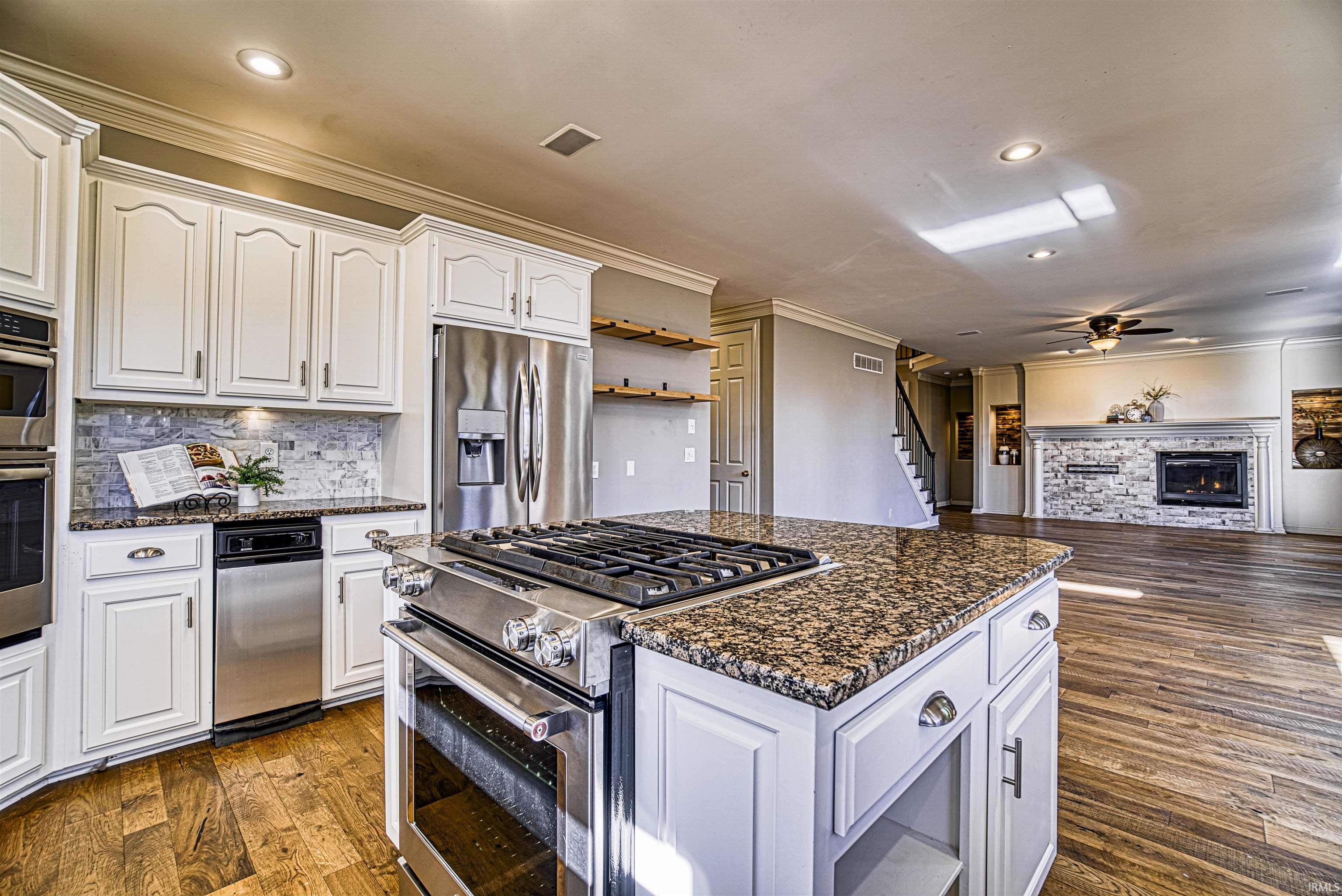 Top of the line stainless steel appliances including gas range and wall oven...