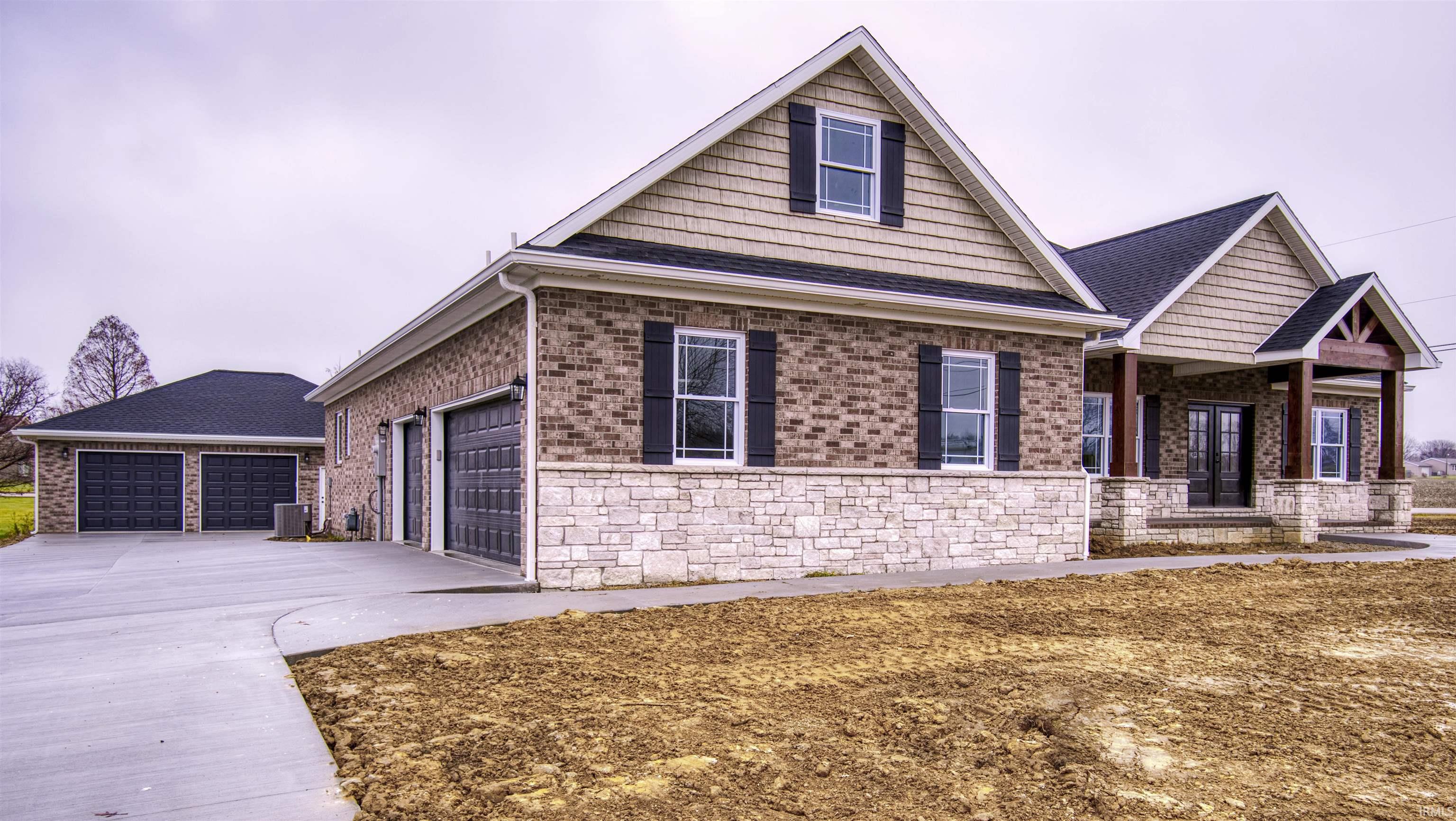This home has great curb appeal with stone accents...covered front porch...side load garage!