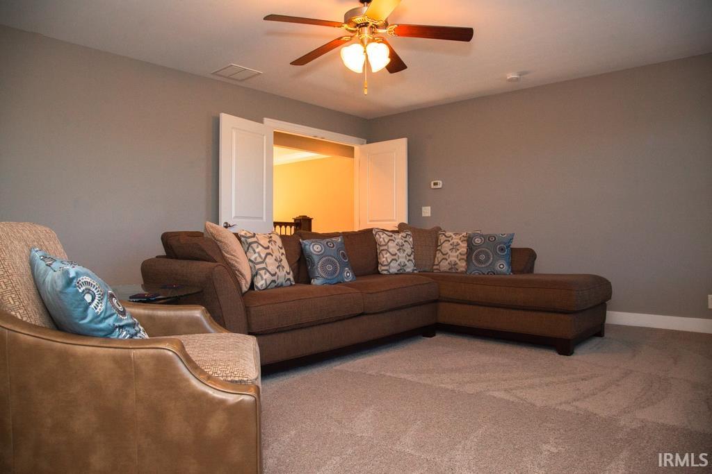 The large upper level family room is perfect for entertaining, games, recreation or just watching movies with the family....