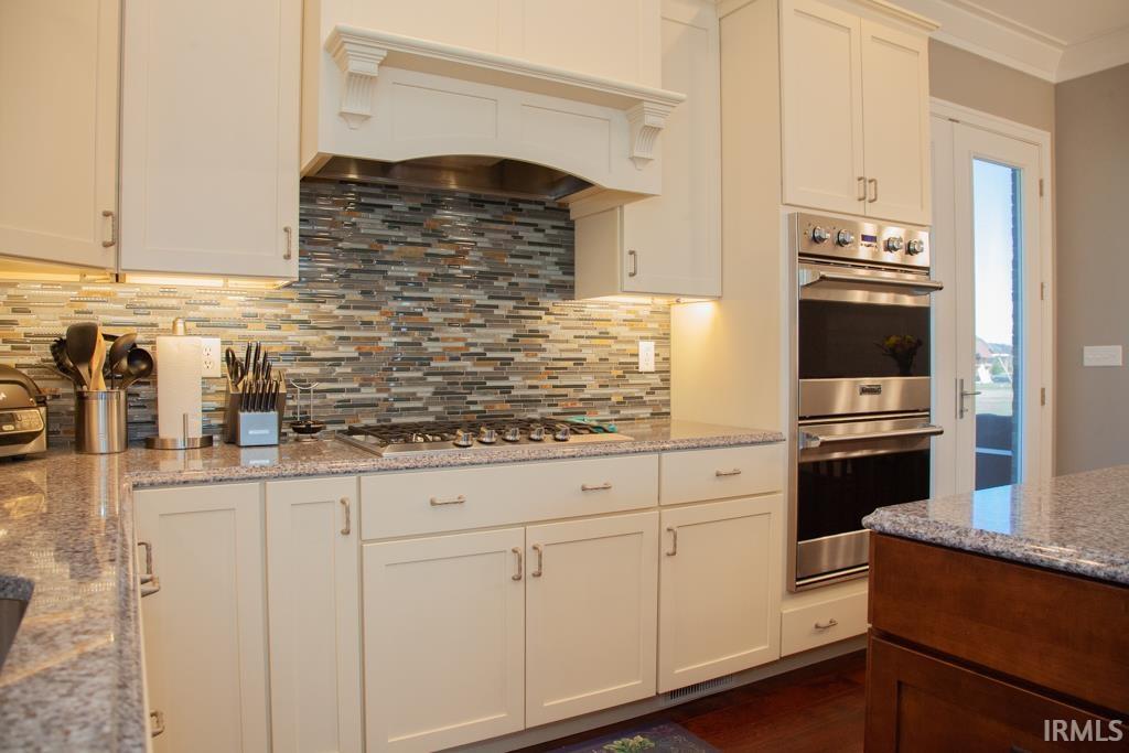 The Kitchen offers custom cabinetry with soft close doors & drawers...