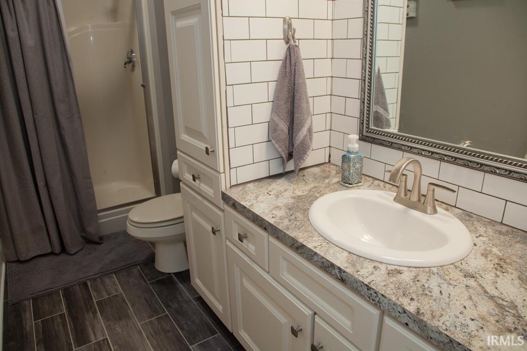Remodeled lower level full bath just off access to the pool!