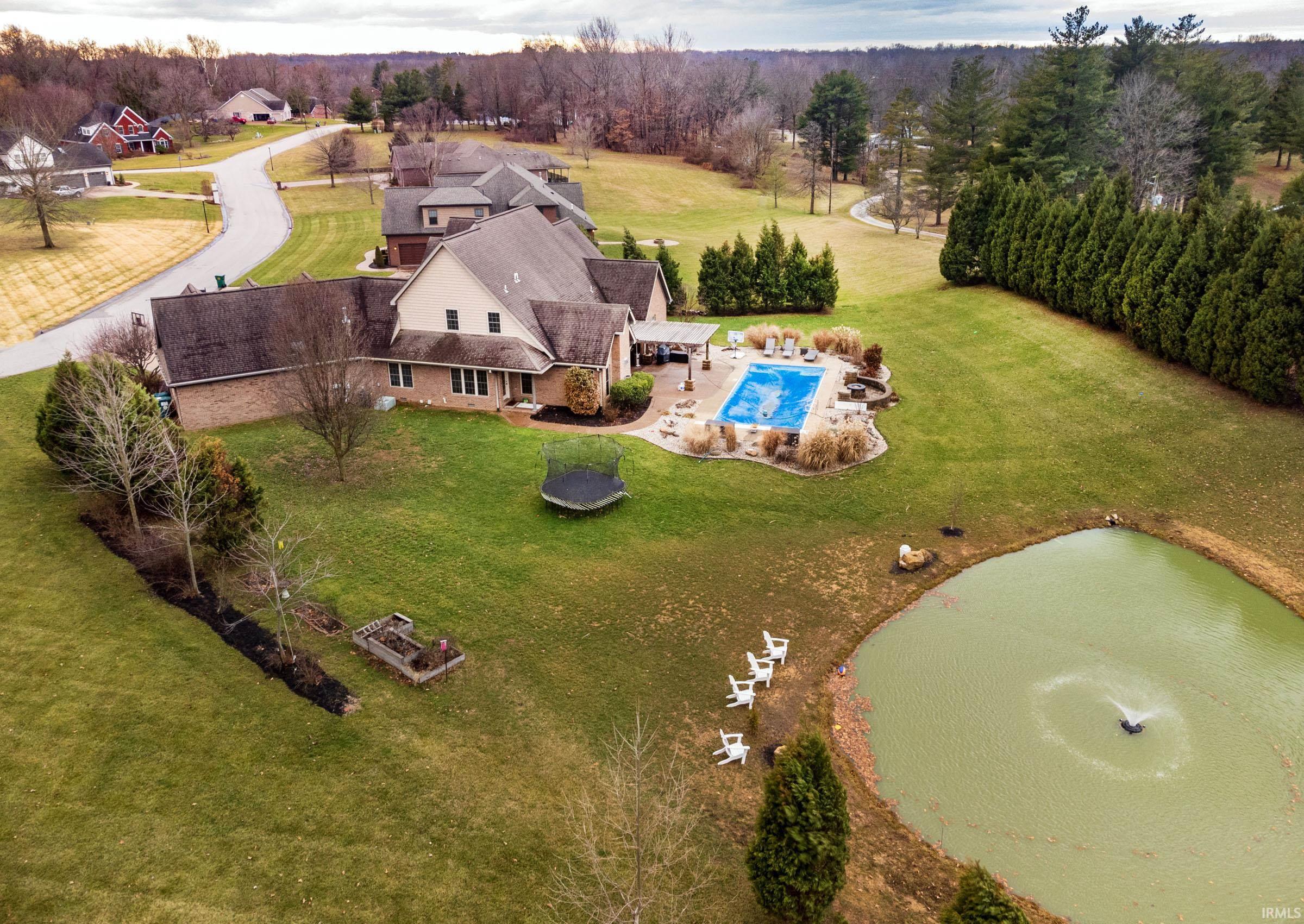 Private Backyard w/ inground pool and pond