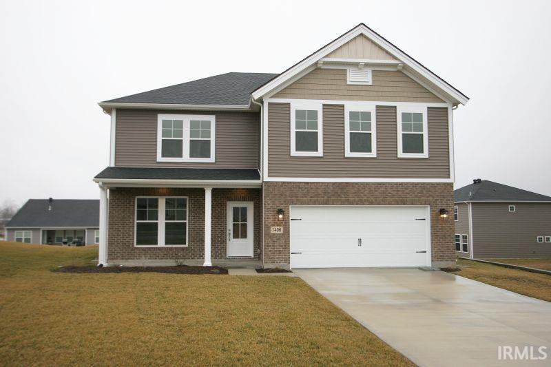 Located in Hunters Crossing Subdivision in Huntingburg  is this 2562 sq. ft. brick and vinyl Craftsman style new construction home built by Jagoe Homes. The main floor open concept design offers a family room, kitchen and dining area complete with a walk-in pantry and half bath located nearby. The upgraded kitchen features an island bar, granite counter tops, tiled back splash, a pretty blanco sink and stainless steel appliances including a gas range.  A home office is also conveniently located on level one. Level 2 includes a spacious owner's suite with an oversized bedroom, large bathroom with a twin sink vanity and an abundance of cabinets, a  fiberglass shower, and a gigantic walk-in closet. Three additional bedrooms, a full bathroom, the laundry room, and a bonus room comlete level 2. Luxury vinyl plank is installed throughout the main level as well as all bathrooms and laundry room. The 2 car attached garage, rear patio, and welcoming front porch complete this attractive home. Be sure to click on the Virtual tour to view this home. Jagoe Energy Smart "Energy Rebate Program" available through Feburary 2023 with NO energy bills for 2 years(up to $200 per month) gas and electric.  Special Interest rate incentive of 5.5% on a 30 year fixed mortage available for qualified Buyers.