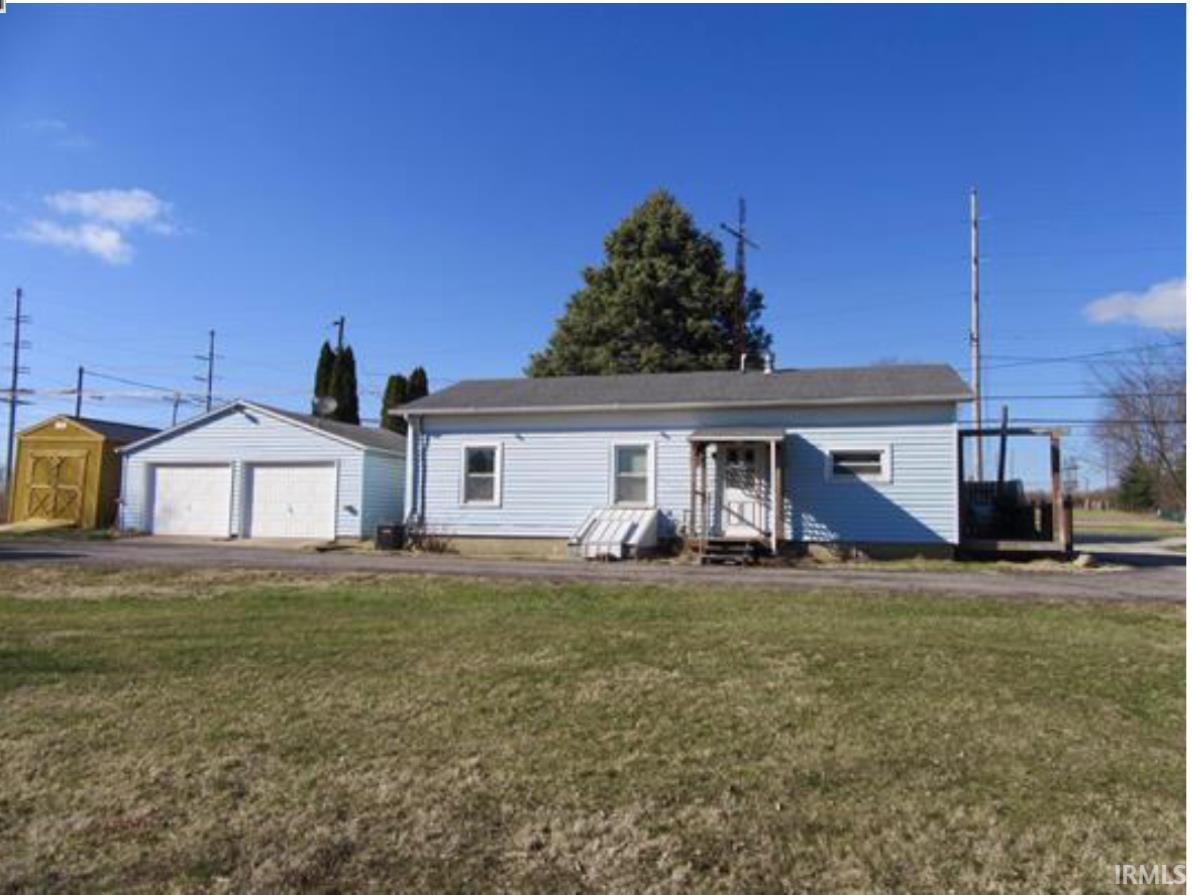 Ranch Home, Garage, Shed, over half an Acre, City Sewer, Well Water.