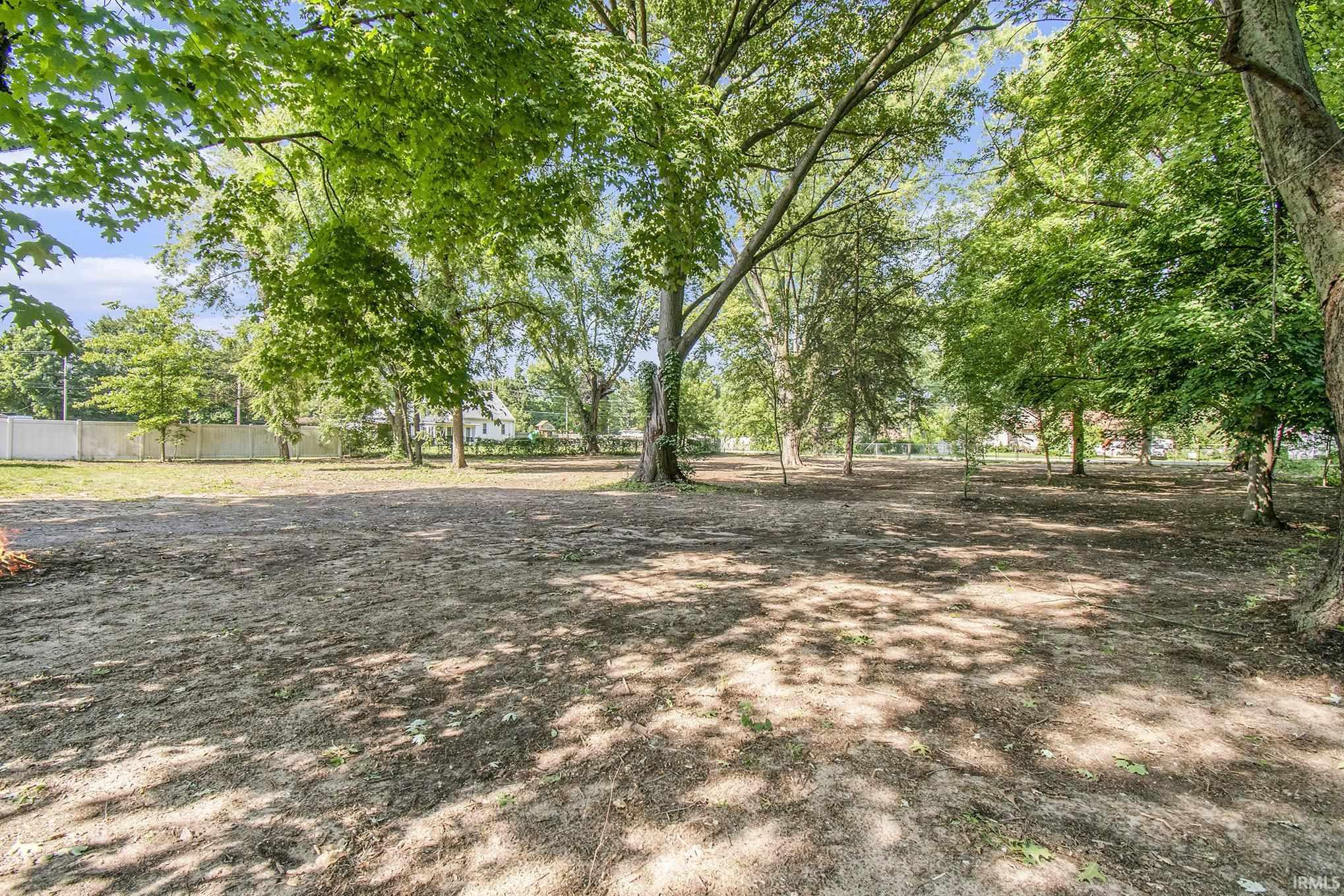 Enjoy the Huge Partially Fenced Backyard that is Recently Seeded Ready to Go For a New Owner!