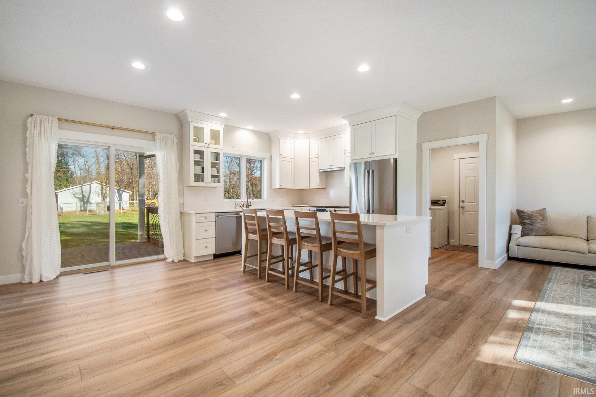Patio Doors Lead to Covered Patio & Large Fenced-In Backyard