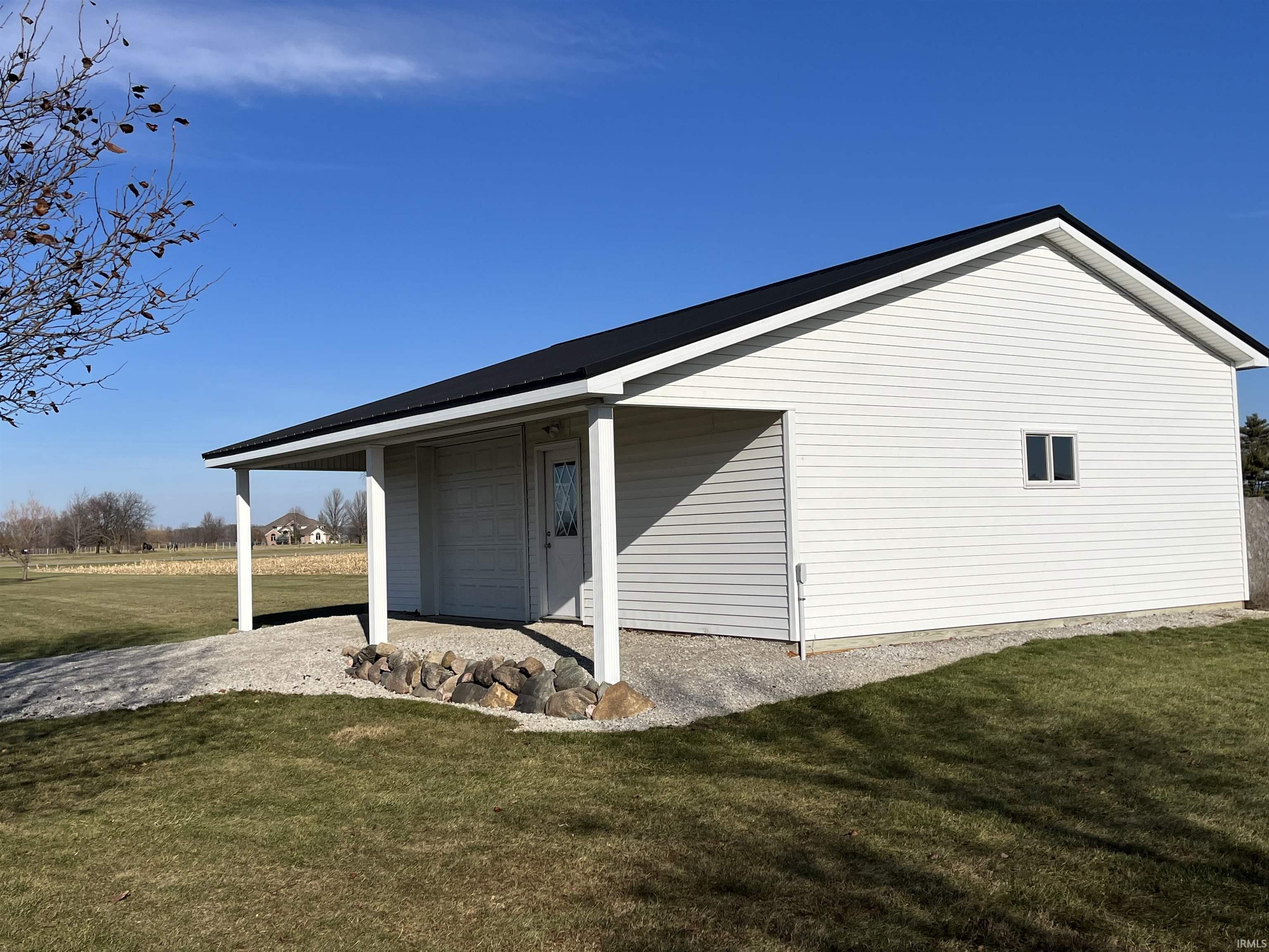 Approximately .8 acres out in front of the pole barn could be fenced as pasture.