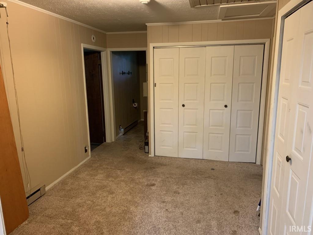 Was used as an office. Access to basement in this room.