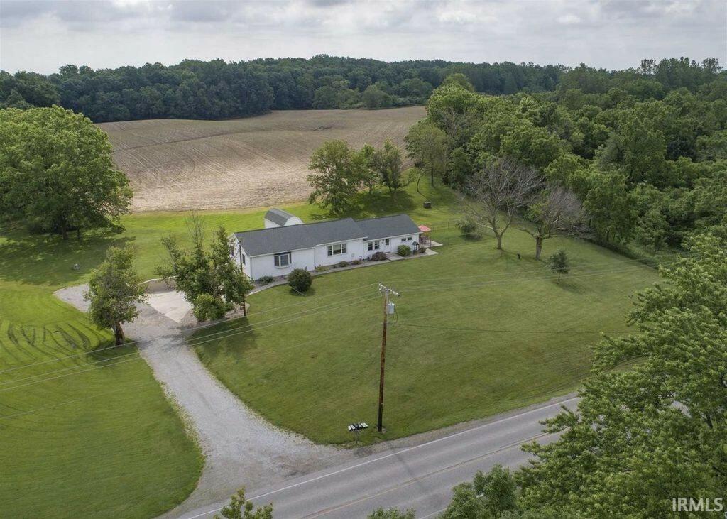 Privacy of multiple acreage property with rolling hills, private woods, and natural landscapes.