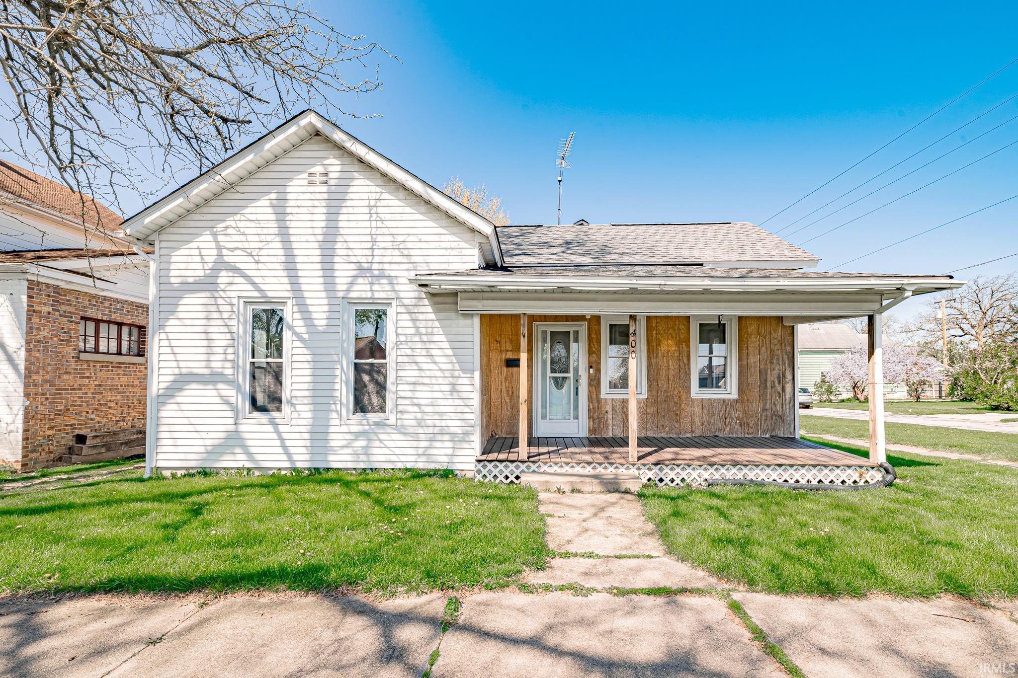 Adorable starter home in Garrett! If you’re looking for an alternative to renting, this 2 bedroom, 1 bath home is a great option for an affordable price. Home sits on a double lot and has a 1 car detached garage and shed with overhead garage door. Inside the home welcomes you with great natural light, a spacious living room that opens into the formal dining area, and an updated kitchen with new cabinets, new countertop, and new refrigerator. Some features of the home include: gas forced air, central air, nice sized laundry room, newer windows, new flooring, fresh paint, and roof tear off in 2022.