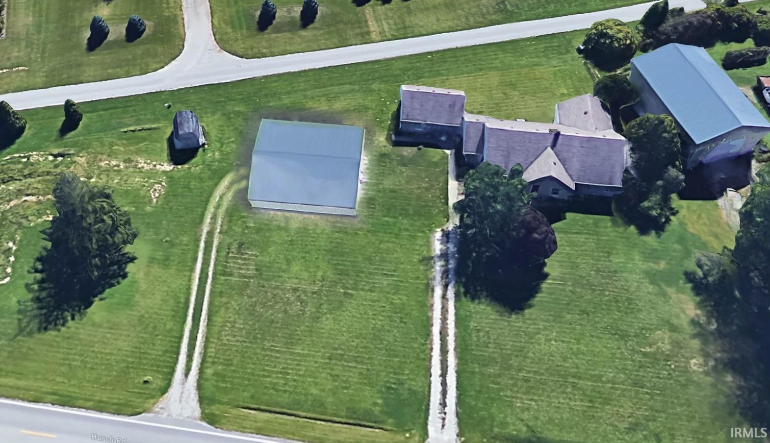 The building depicted in grey is a 30 x 30 detached garage. Estimated cost 50k fully finished.