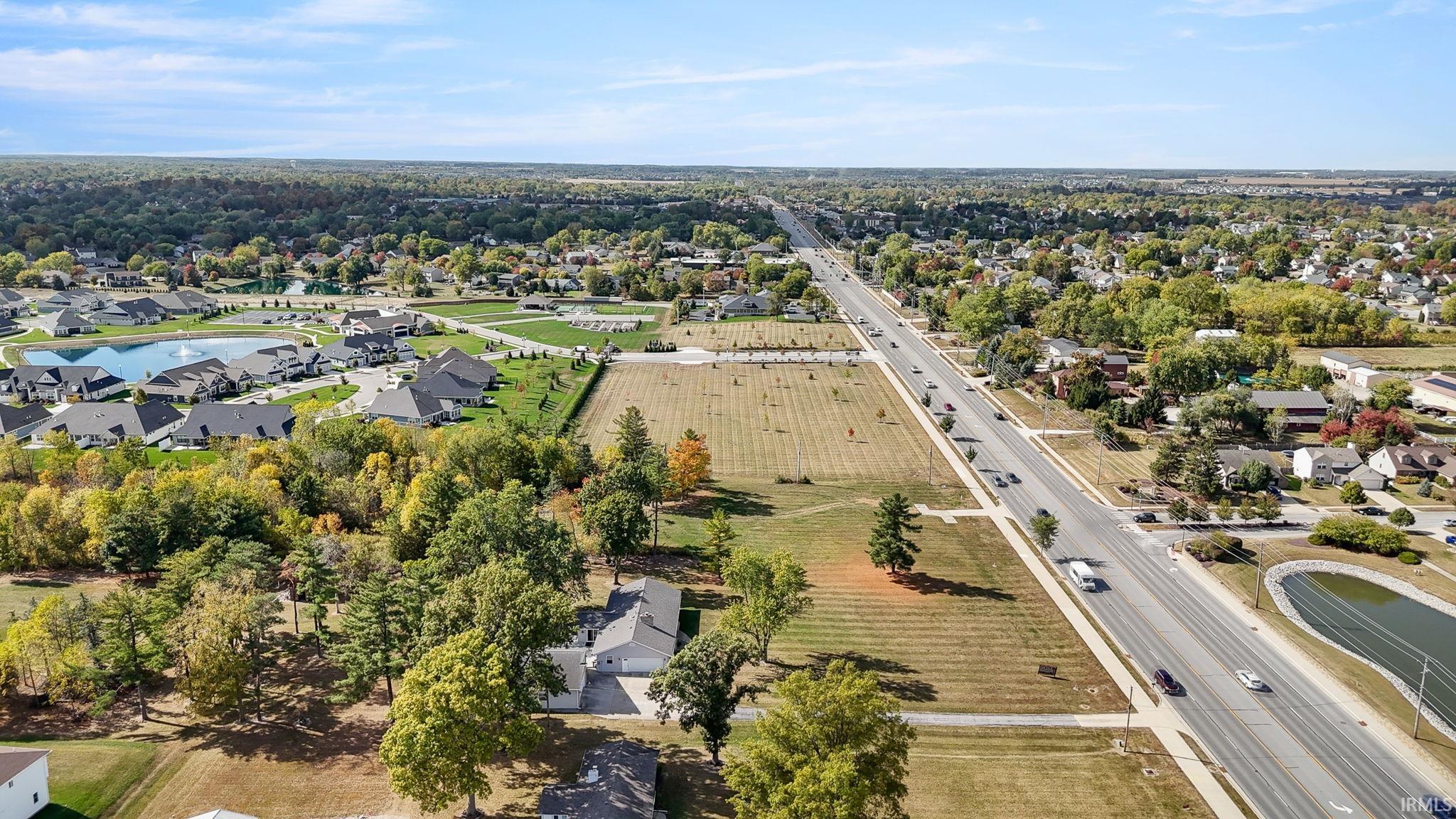 Aerial perspective of suburban area with a main thoroughfare