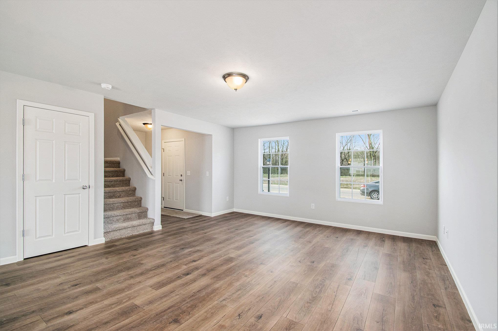 This traditional 2 story floorplan is laid out with 4 bedrooms on the second floor and several upgraded finishes.  The flooring is consistent throughout the entire first floor and there is a built-in bench for storage in the foyer.