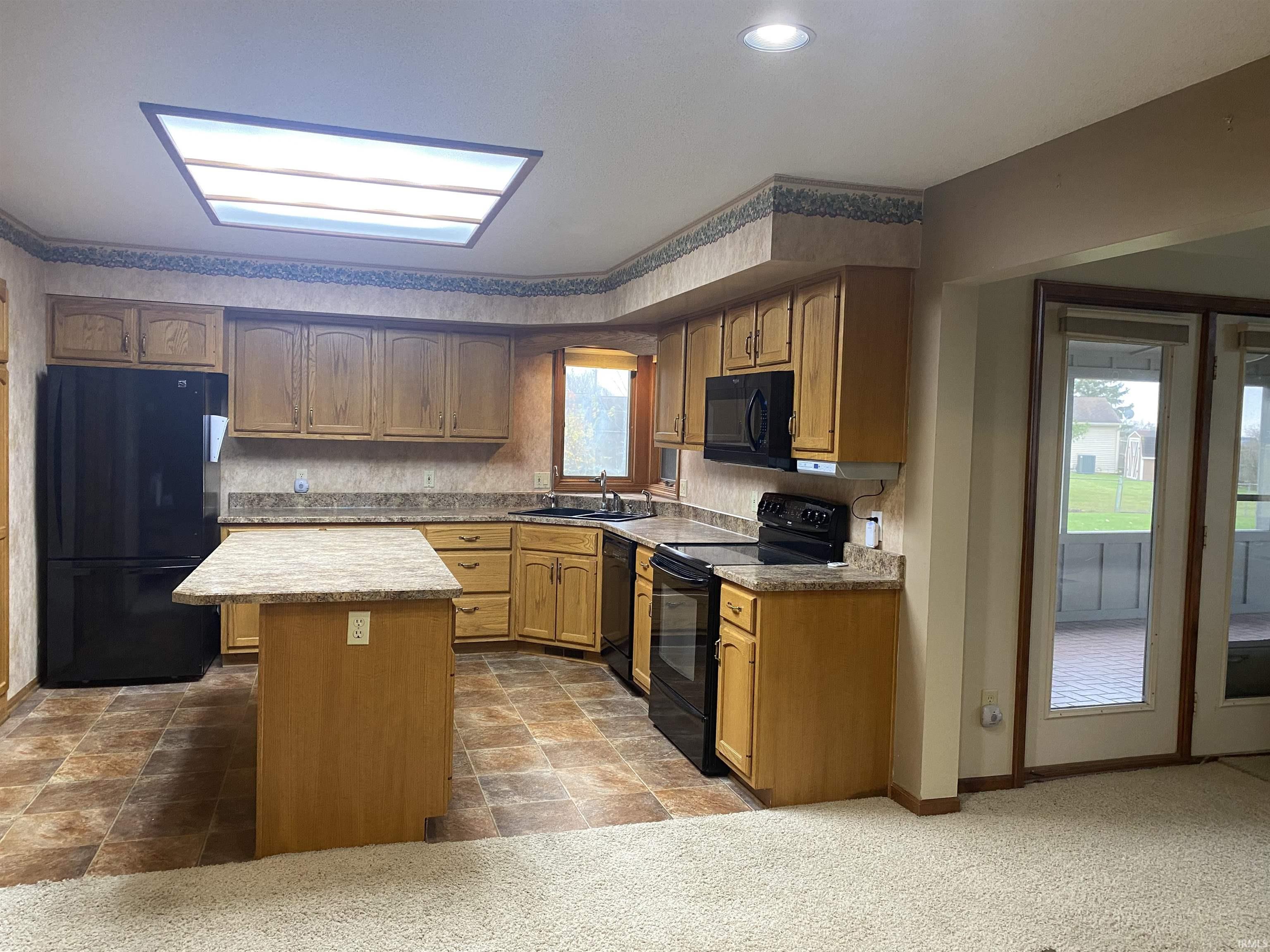The spacious kitchen comes with all the appliances, plus a kinetico reverse osmosis system under the kitchen sink.