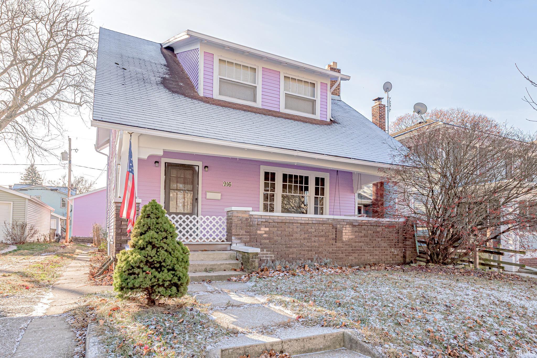 Step into this charming and picturesque home located in the hallmark movie looking neighborhood of Fort Wayne, IN. The original woodwork throughout the house exudes character and warmth, making you feel right at home as soon as you walk through the door. The large detached garage is perfect for parking your vehicles or using as a workshop, while the covered front porch is ideal for sipping your morning coffee or watching the sunset in the evenings. Inside, the hardwood floors add to the classic charm of this beautiful property. And with a park just a short distance away, you'll have plenty of opportunities to enjoy outdoor activities with family and friends. Don't miss out on this opportunity to own a piece of history in a charming neighborhood in the 05!