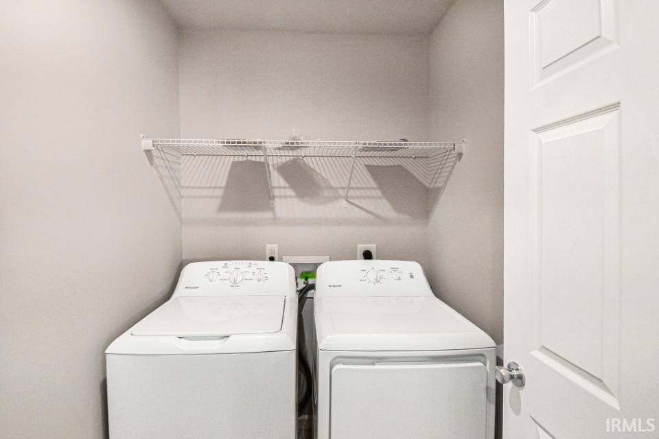 The laundry room is situated near all bedrooms and includes a washer & dryer!