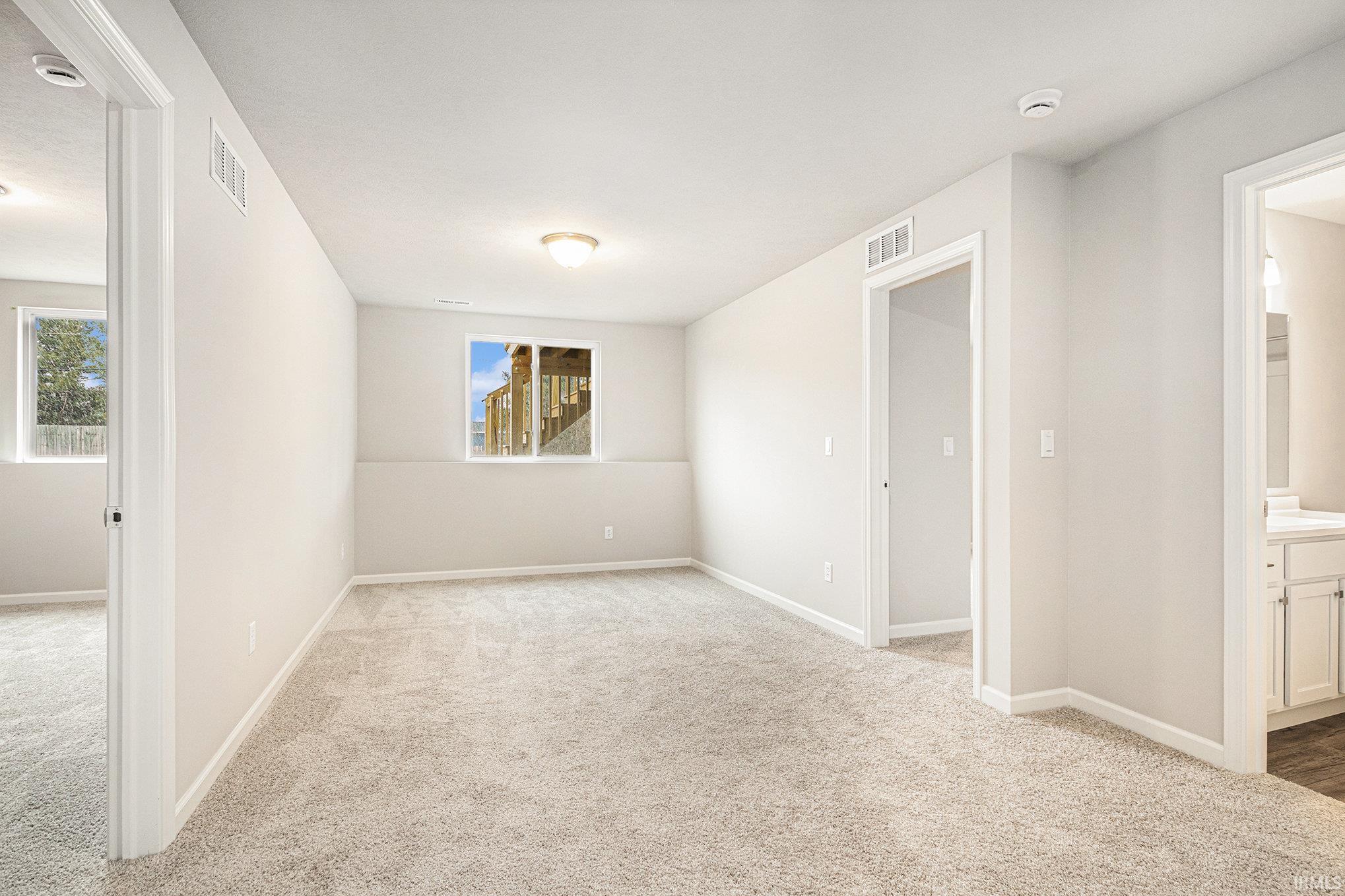 The lower level includes a Rec Room, 3 bedrooms large bedrooms and a full bath.